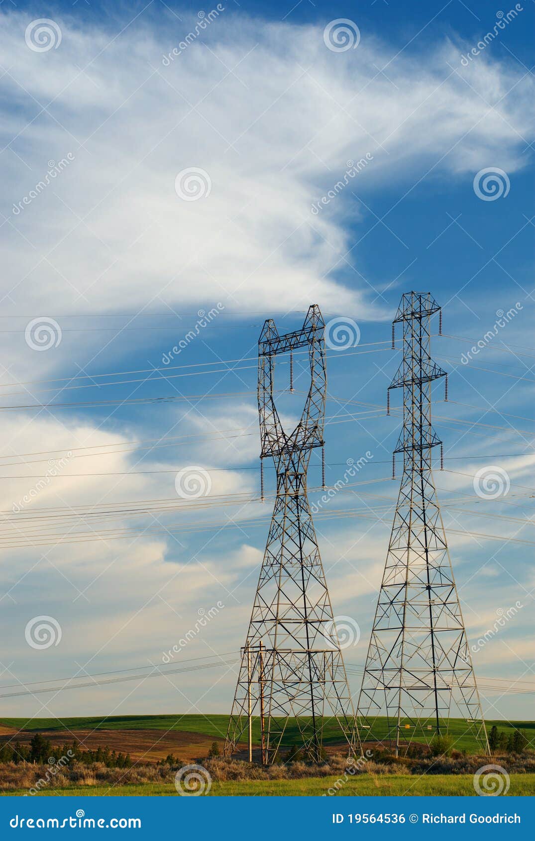 Two Pylons at Sunset stock photo. Image of energy, utility 19564536