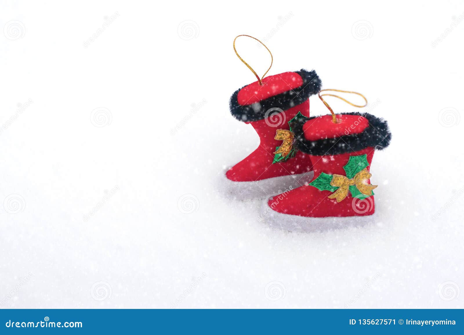 Two Decorative Christmas Boots on Snow White Background. Christmas ...