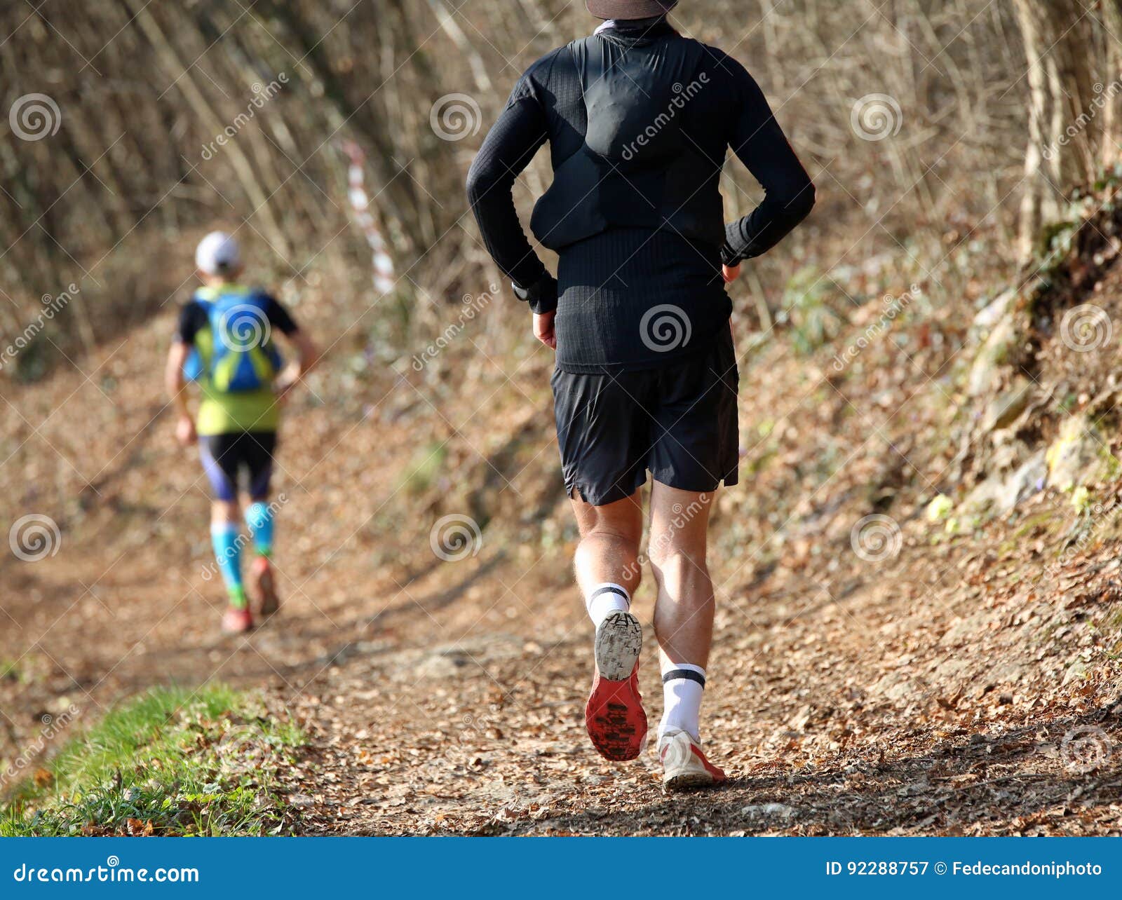 two runners travel along the same straight path