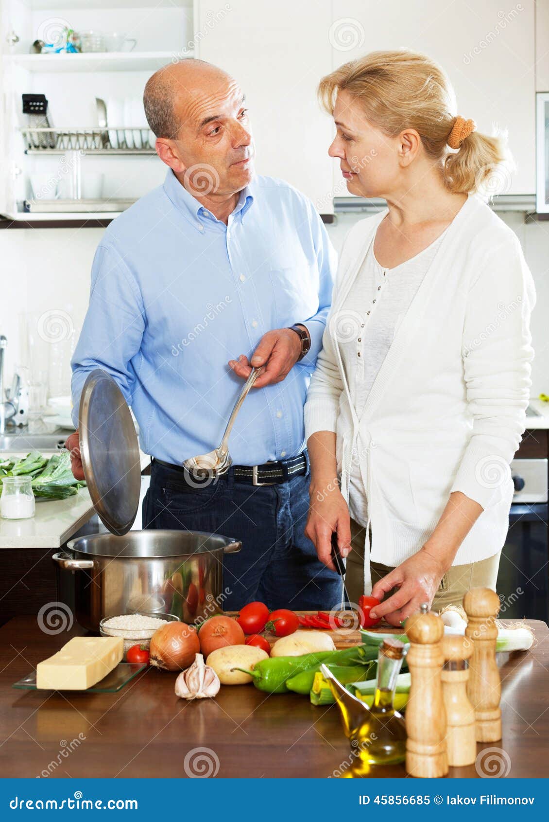 People Cooking And Stirring Chinese Food Capcay Stock Image