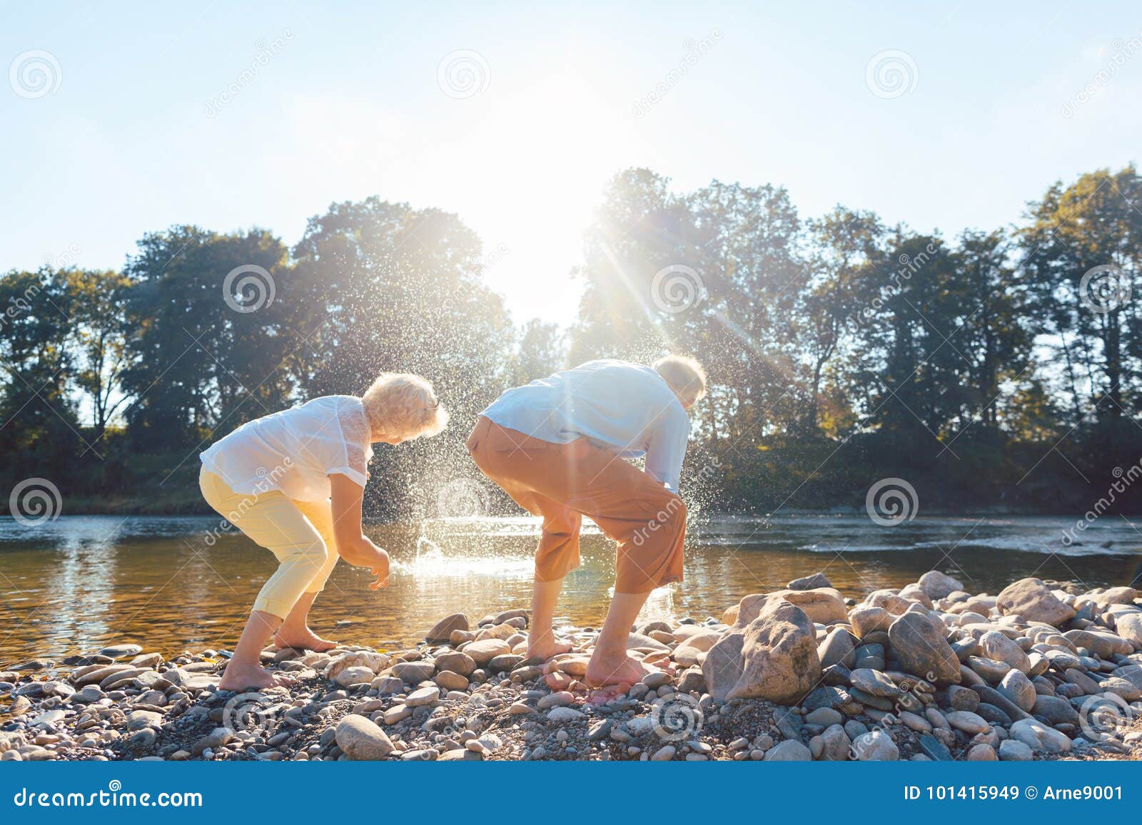 two senior people enjoying retirement and simplicity while throw