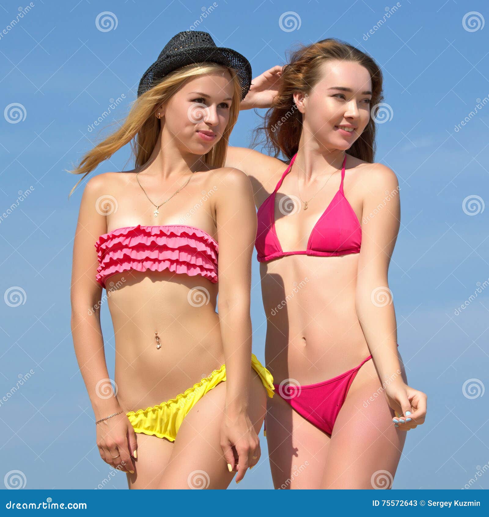 Two girls in bikinis. stock image. Image of women, beach - 75572643