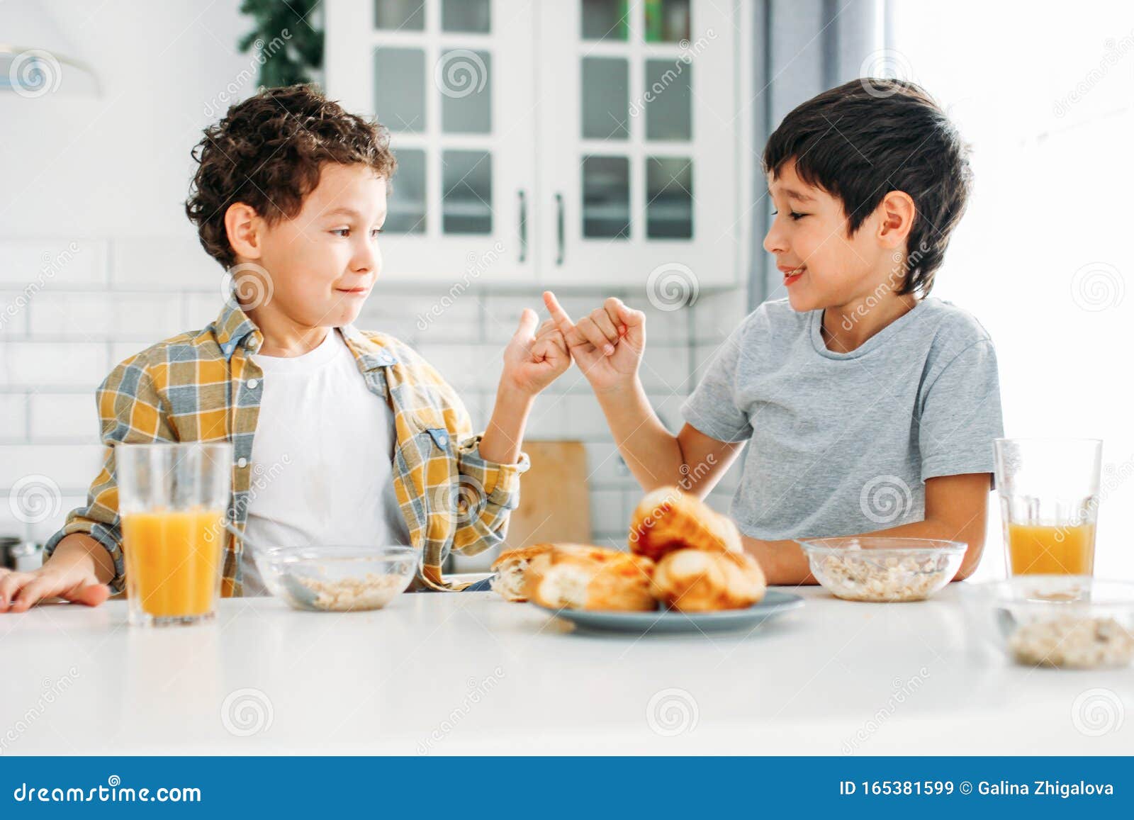 Two Siblings Tween Boys Real Brothers Having Breakfast On Bright