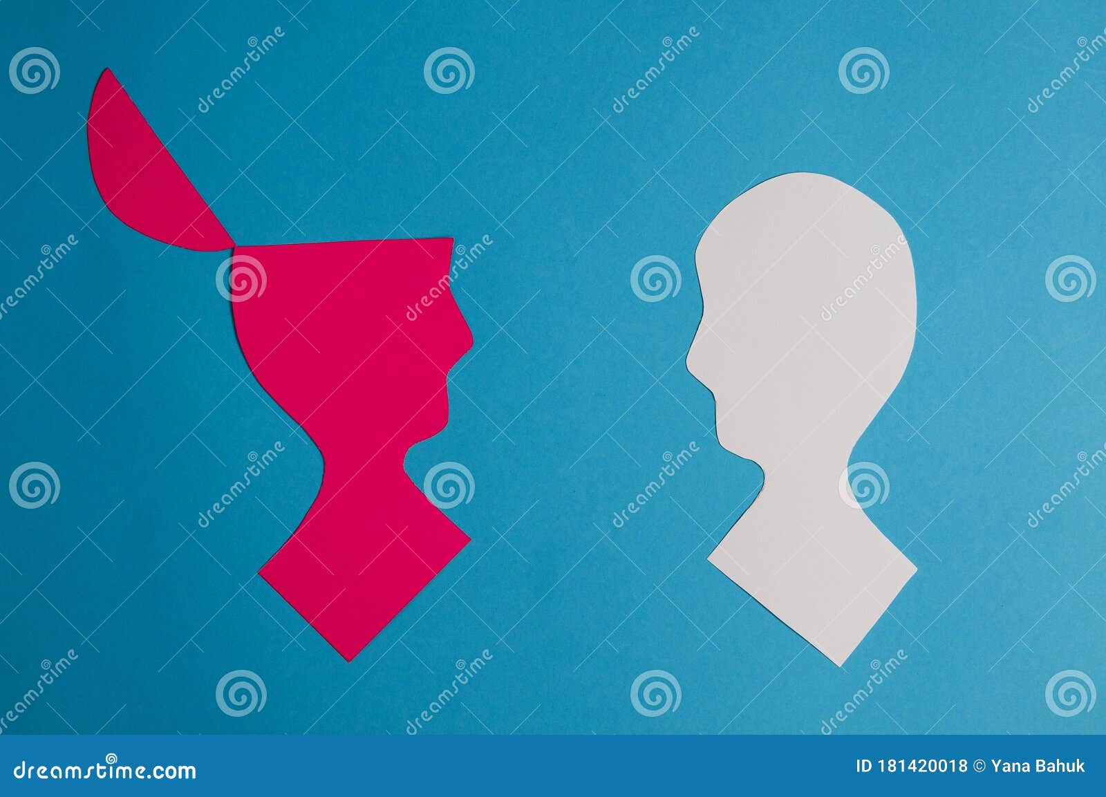 two silhouettes of a head, on a green background. dialogue, negotiations, and collective planning