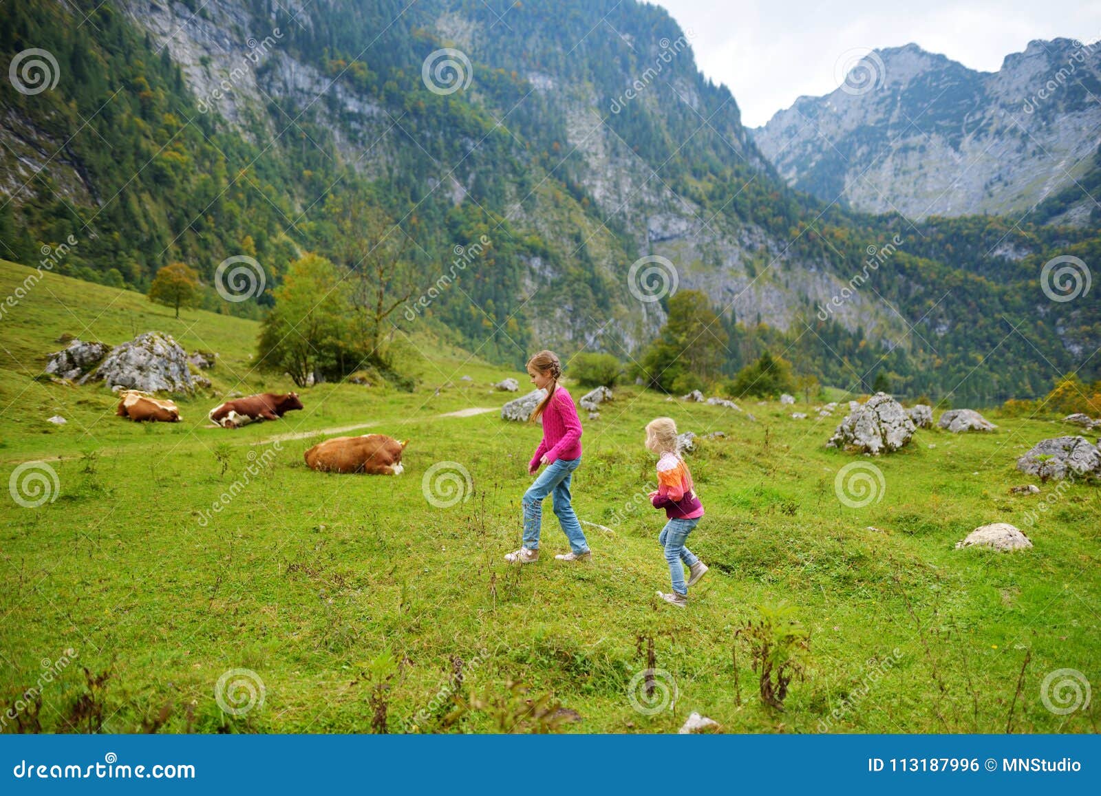 Two Sisters On A Hiking Trails Around Picturesque Konigssee Known