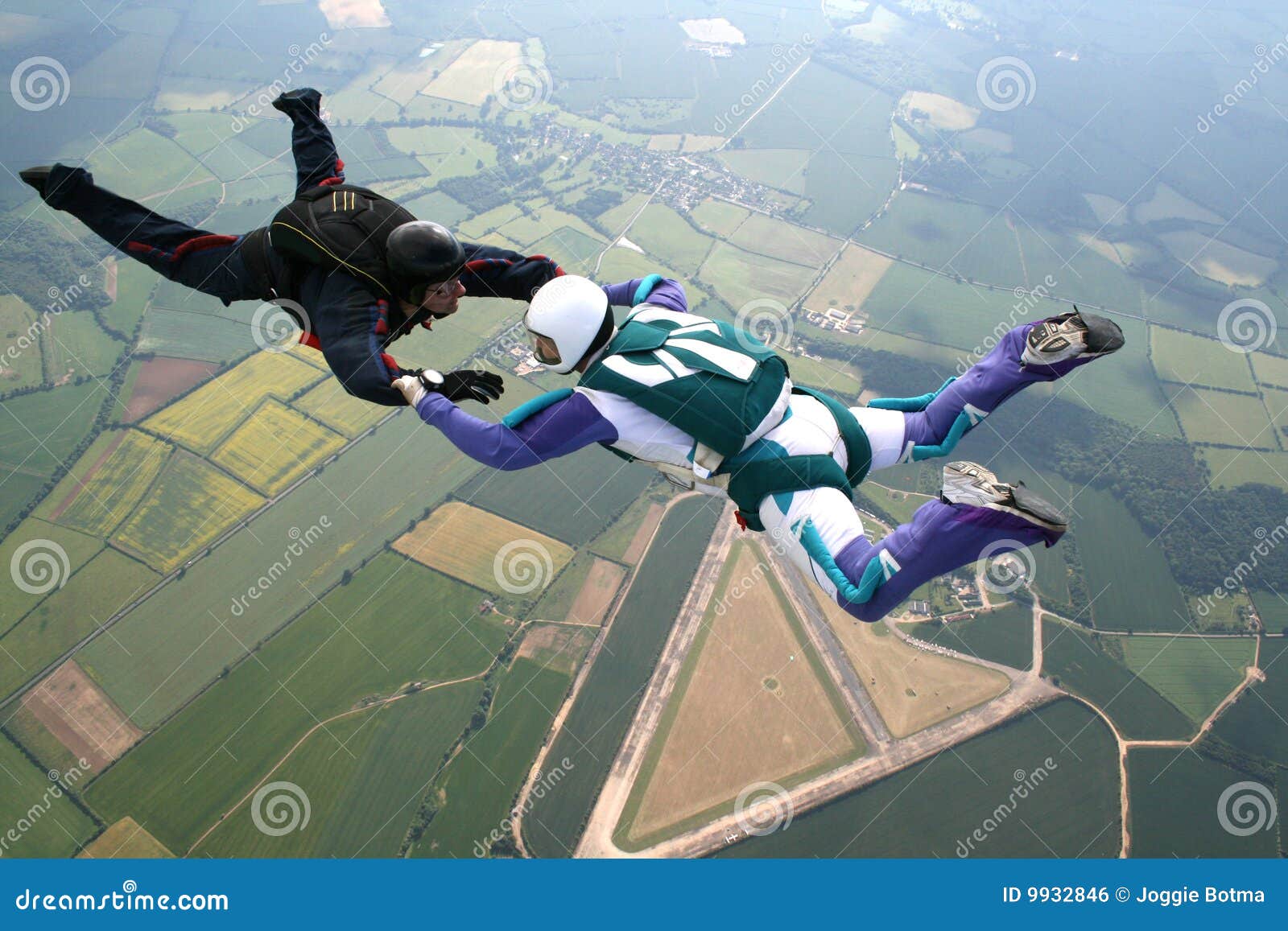 two skydivers in freefall