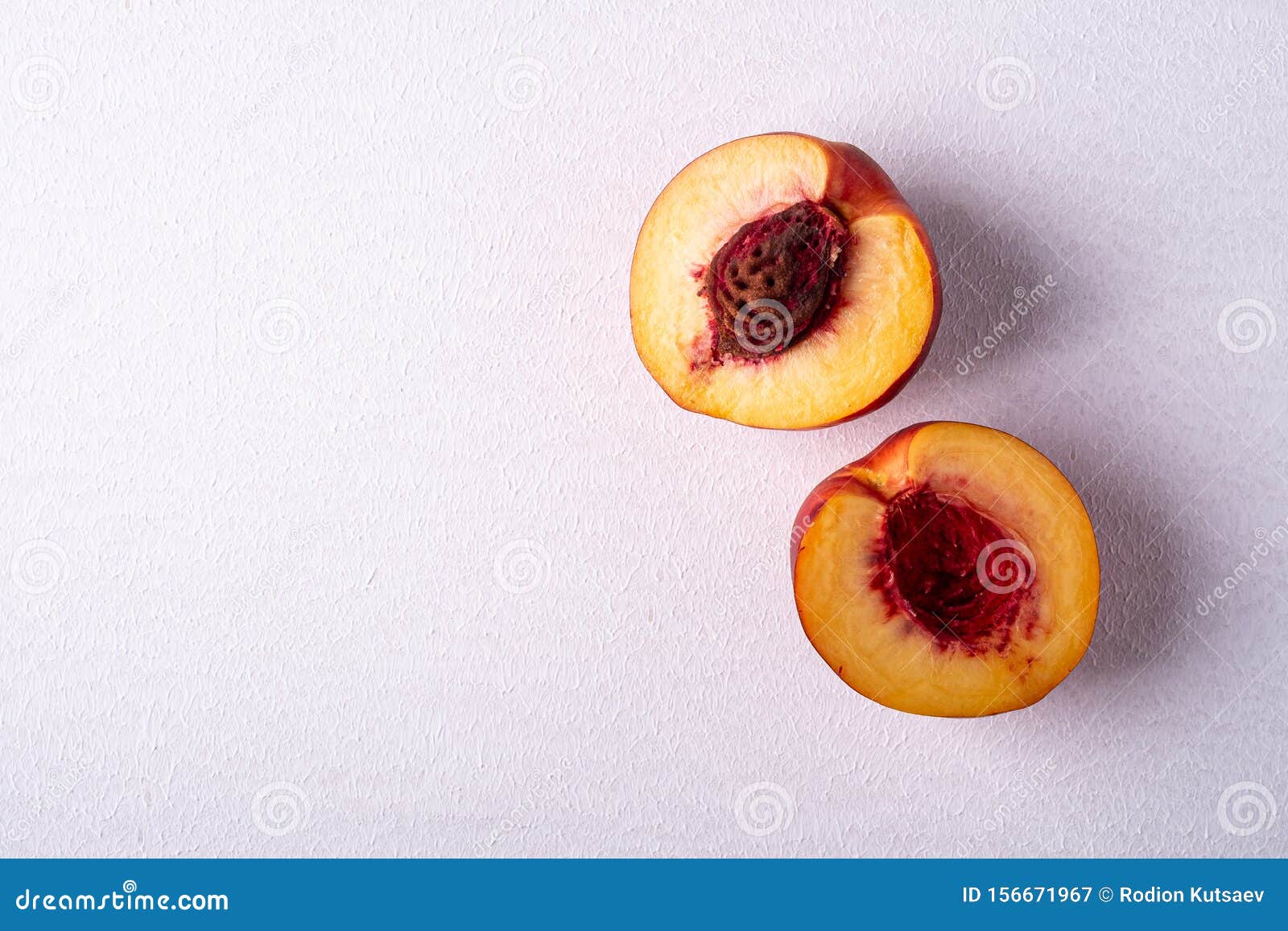 Two Slice of Peach Nectarine Fruit with Seed on White Background, Copy