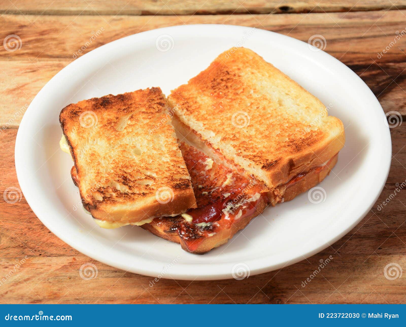 Two Slices Toast Bread With Butter And Jam On White Plate Stock Photo Image Of Fresh Brown