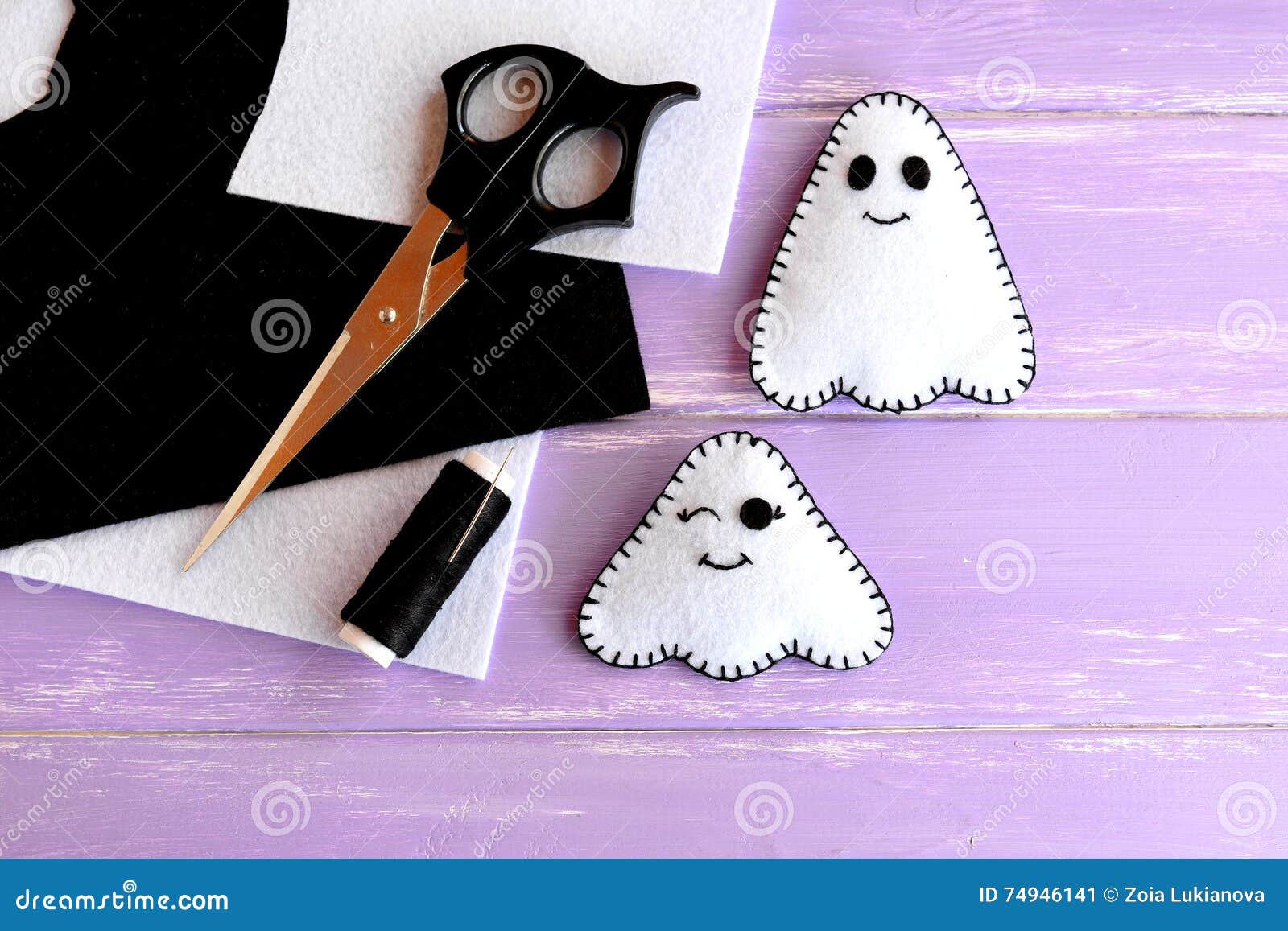 Cute white ghosts crafts, felt sheets, scissors, thread, needles