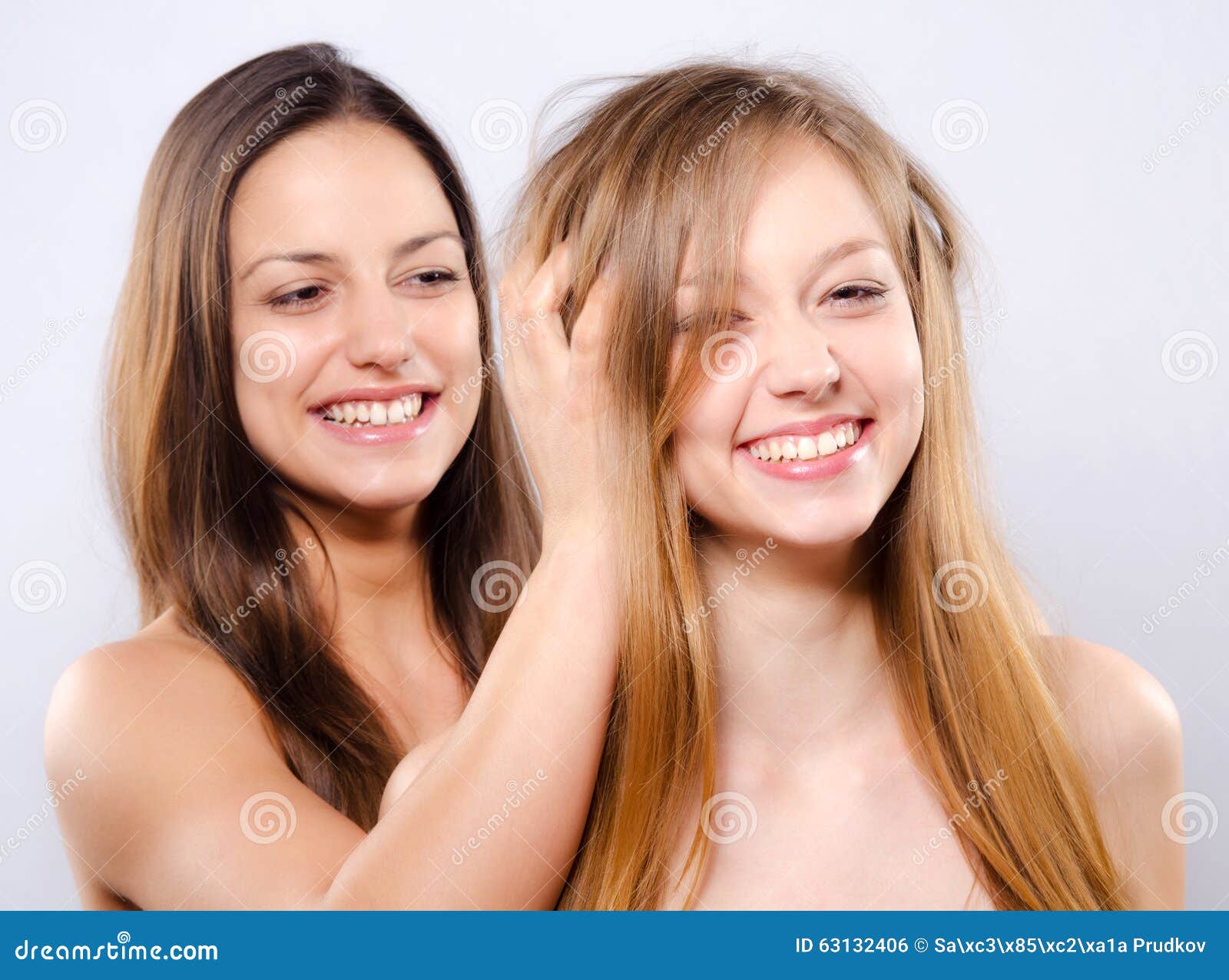 Two Smiling Girls Playing with Their Beautiful Long Hairs Stock Photo -  Image of optimistic, female: 63132406