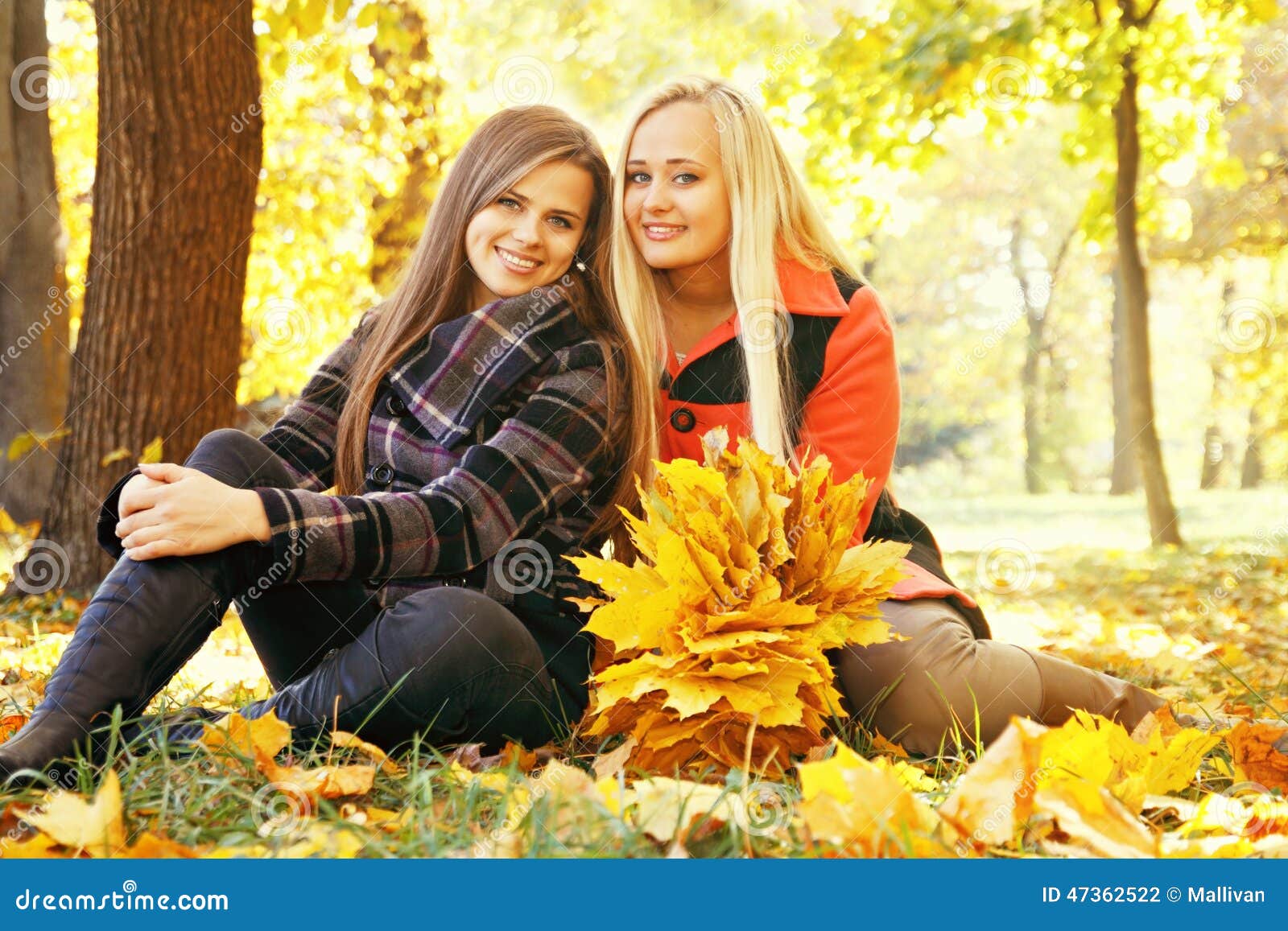 Two smiling girls, tinted stock photo. Image of orange - 47362522