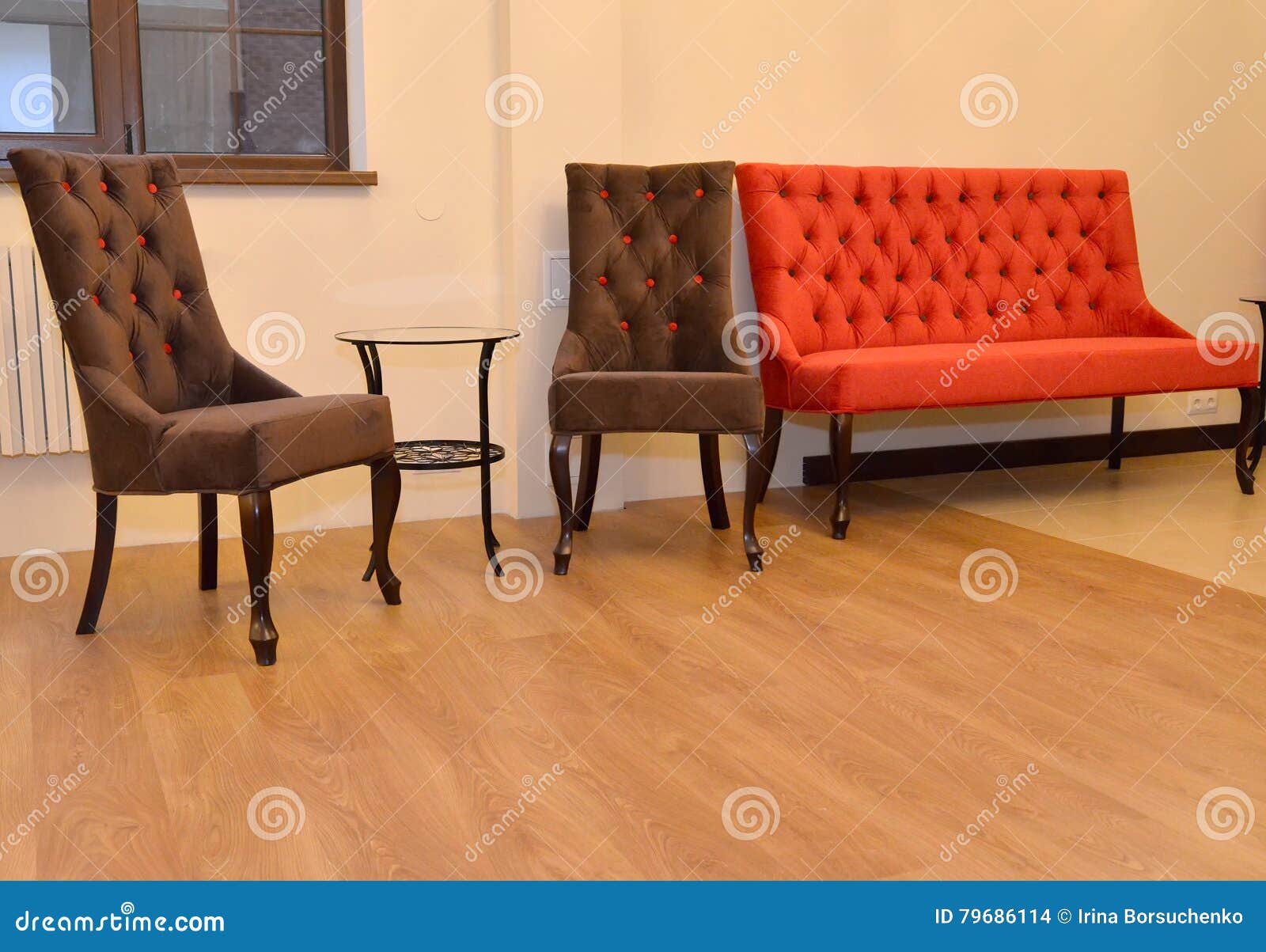 Two Soft Chairs and Sofa Stand at a Wall in a Drawing Room. Int Stock