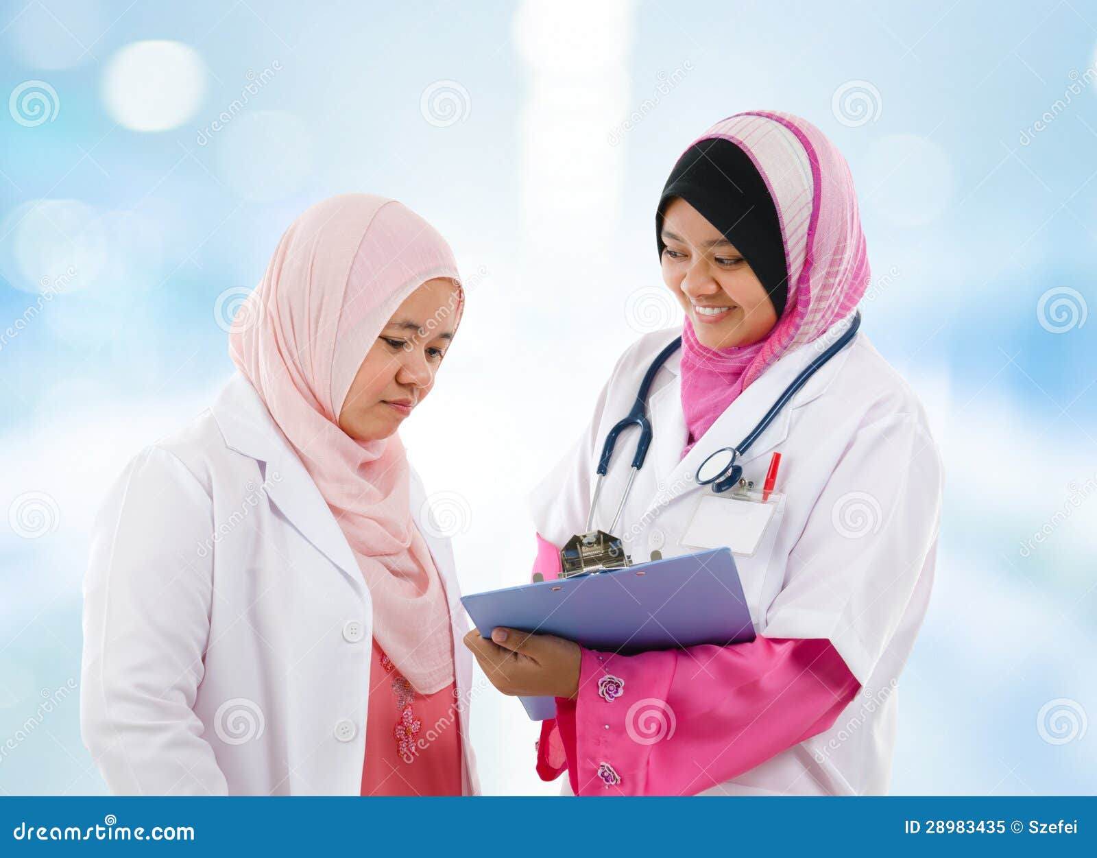 Two Southeast Asian Muslim Medical Doctor Royalty Free 