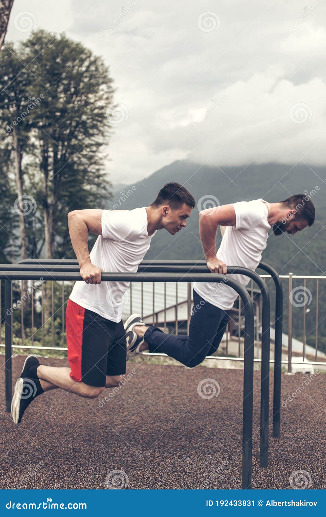 Young fitness woman, stands on push up bars stand, doing plunk