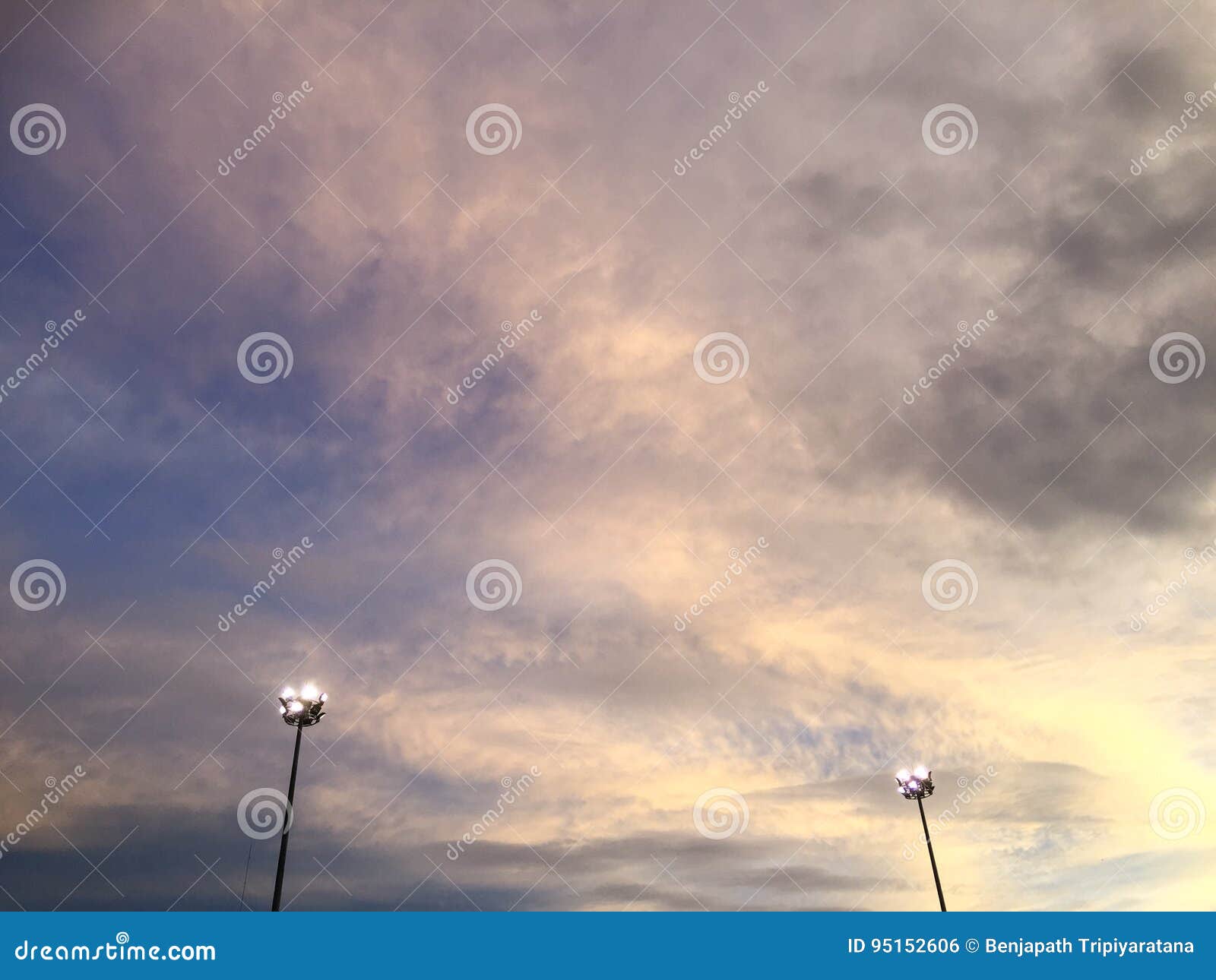 Two Spotlights on Cloudy Blue Sky Stock Photo Image of madness