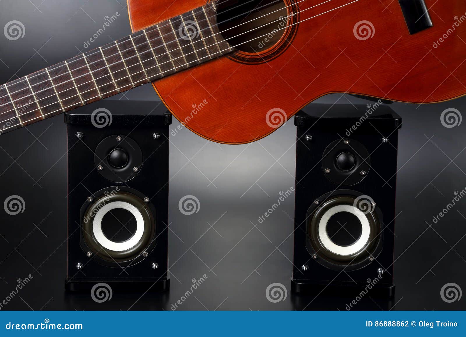 Two Stereo Audio Speakers, and Classical Acoustic Guitar Stock Photo