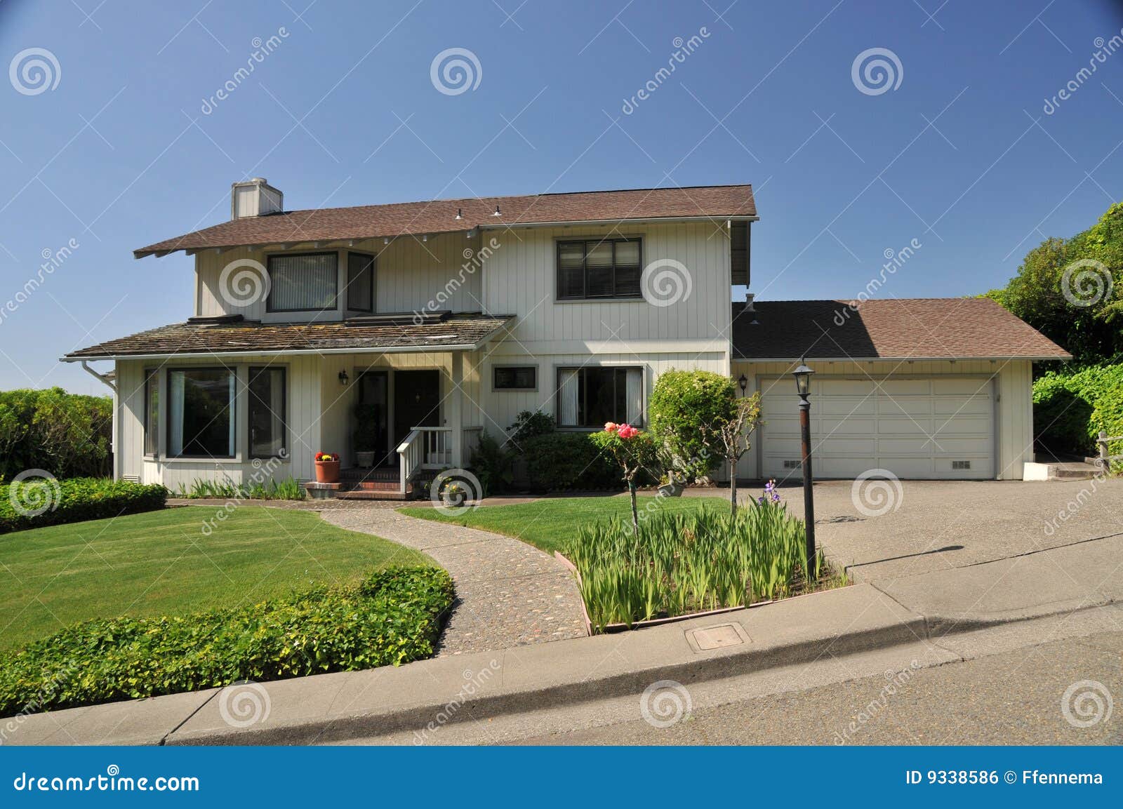 two story house walkway to front 9338586
