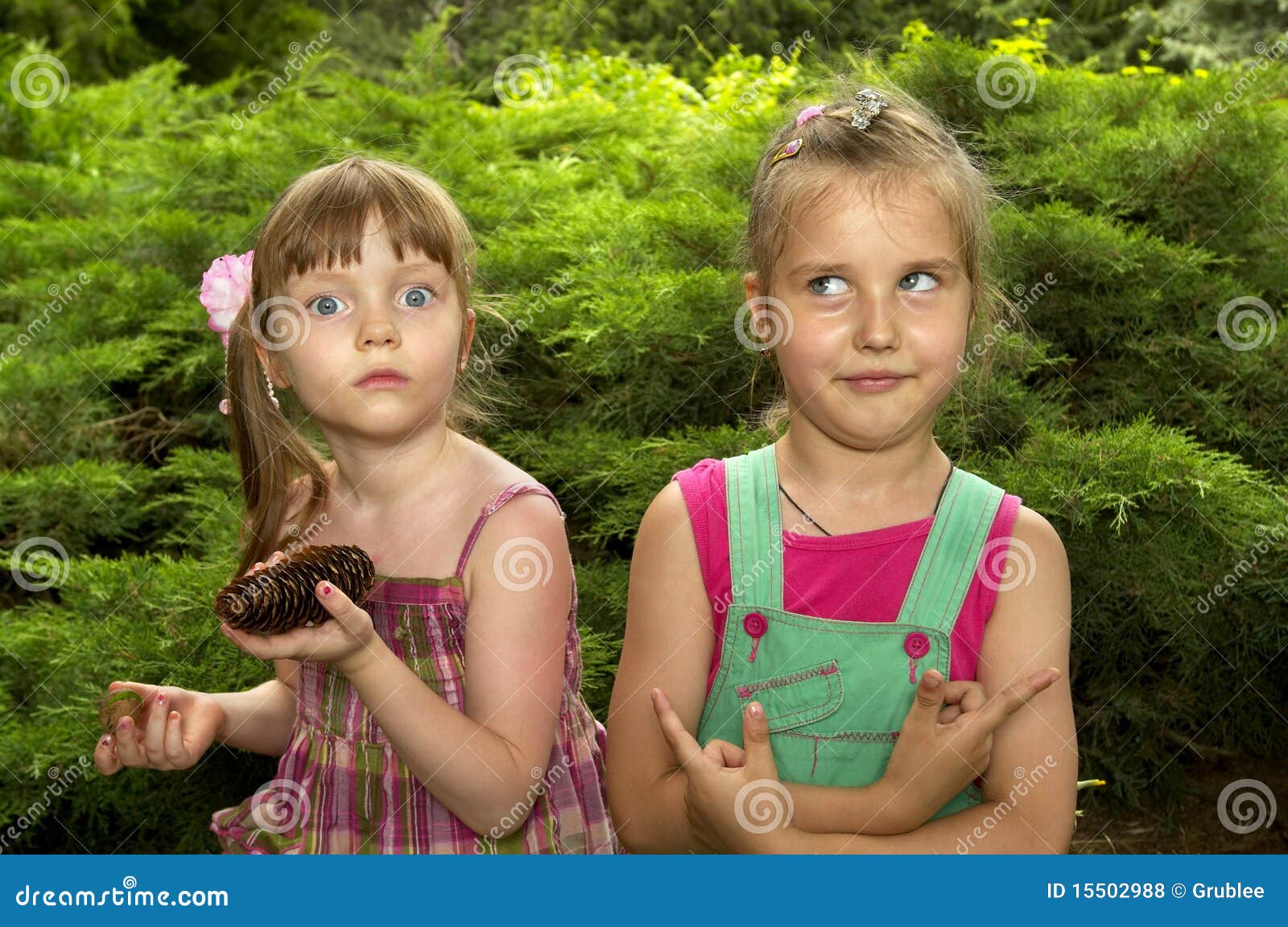 Two strange little girls stock photo. Image of cone, girls 15502988