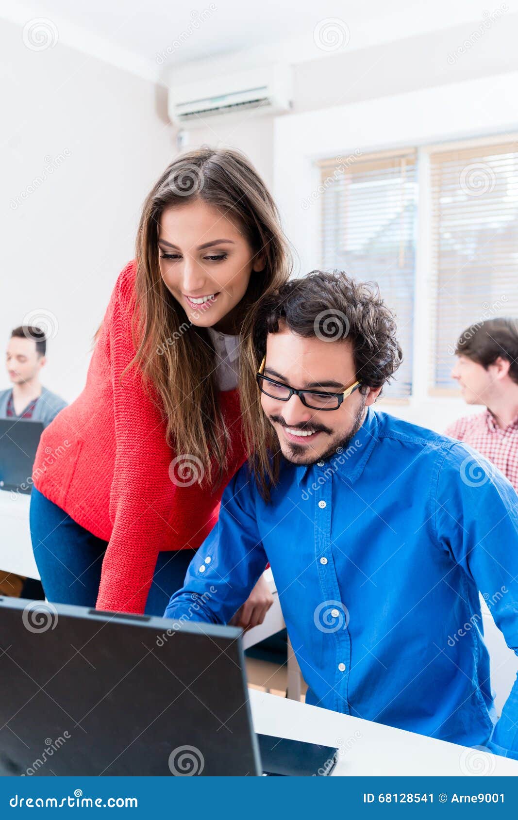 Two Students Discussing Their Work in College Stock Image Image of people, tuition 68128541