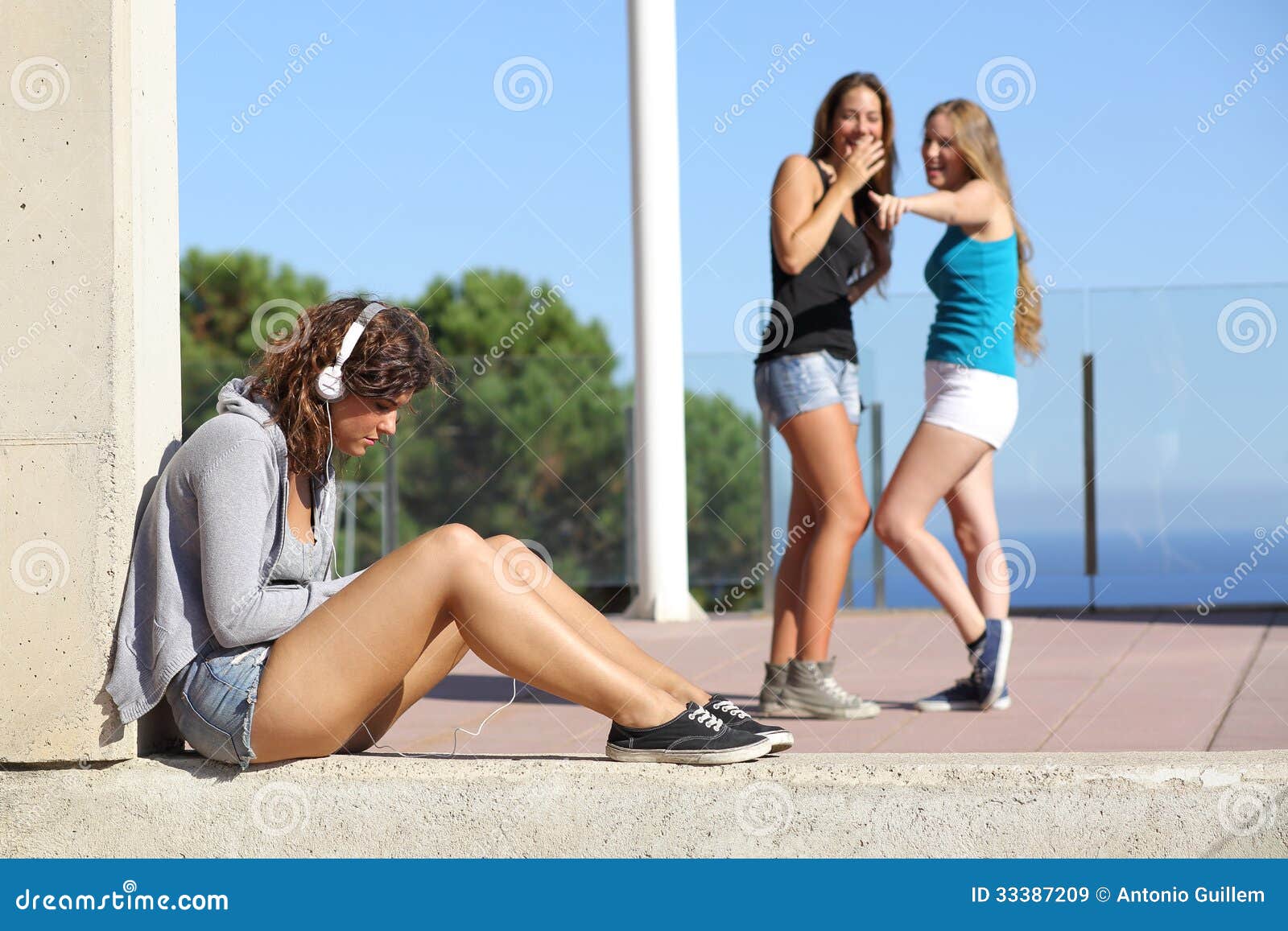 two teen girls bullying another one