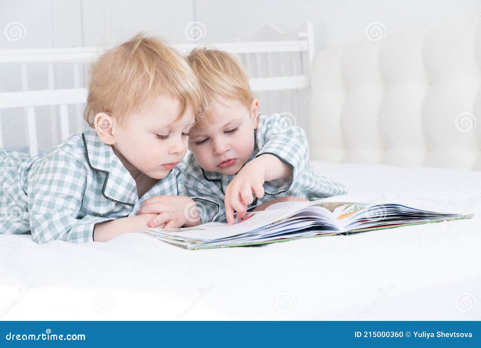 Young Sister On Parents Bed