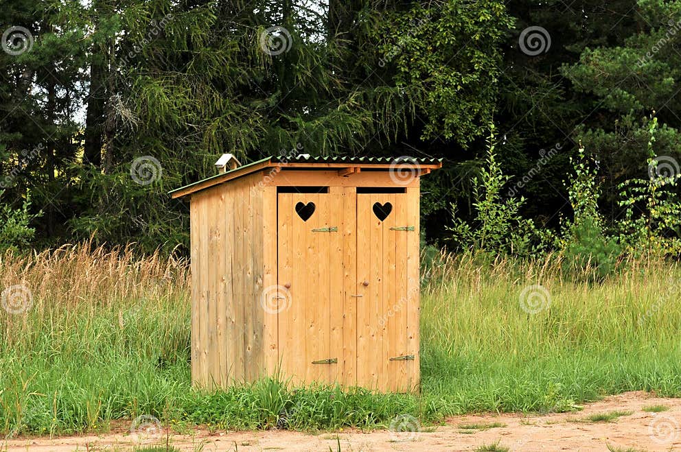 Two toilets in country stock image. Image of public, trees 21880335