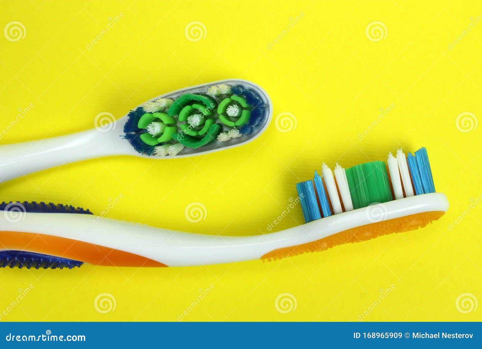 Two Toothbrushes on a Yellow Background Stock Image Image of bristle