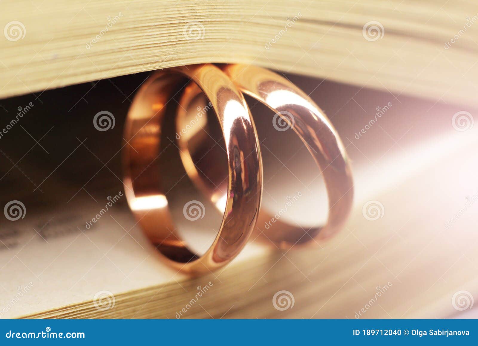 Two Wedding Rings on a Book Stock Photo Image of heart, corinthians
