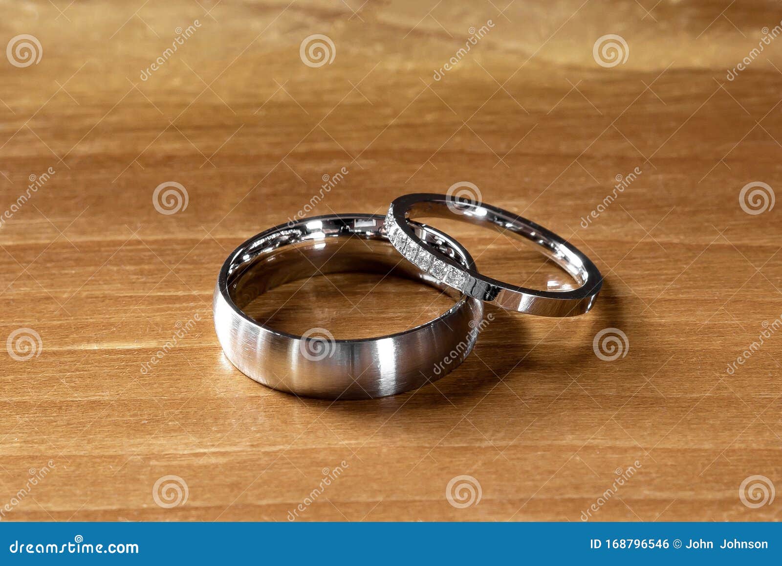 Two Wedding Rings on Wood Background Stock Photo - Image of fashion ...