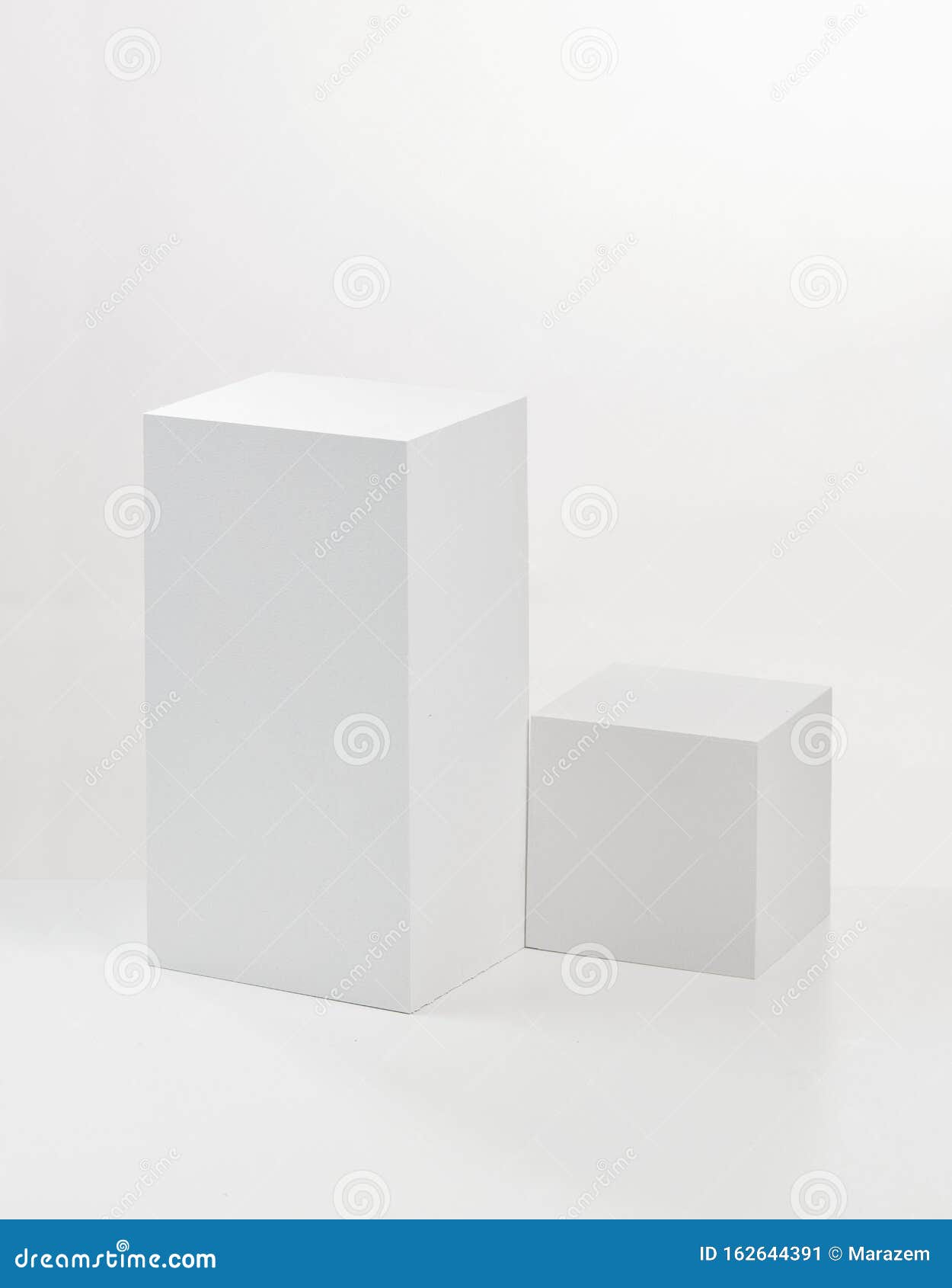Two white cubes stock image. Image of shape, perspective 162644391