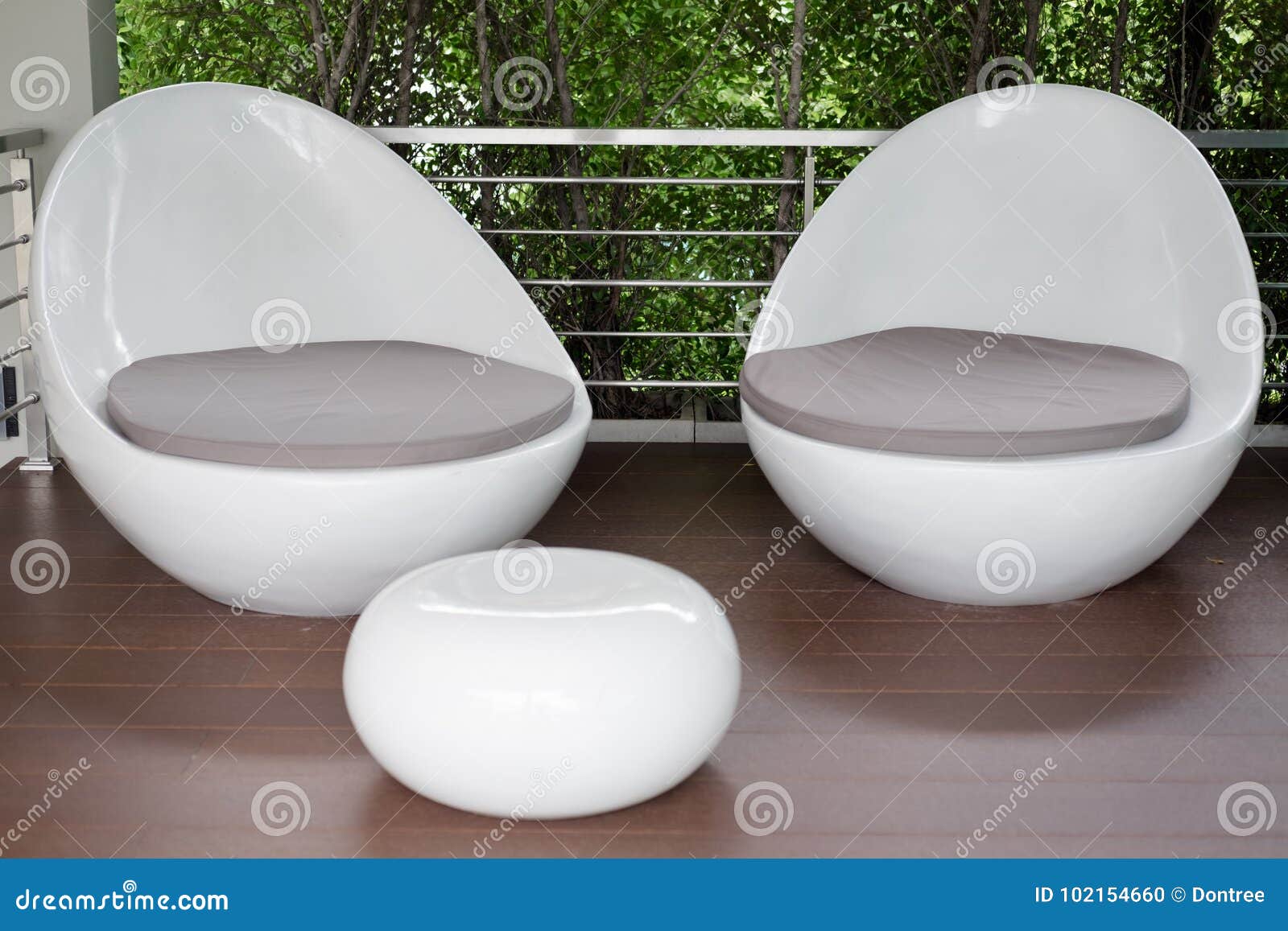 Two white egg chairs stock photo. Image of furniture 102154660