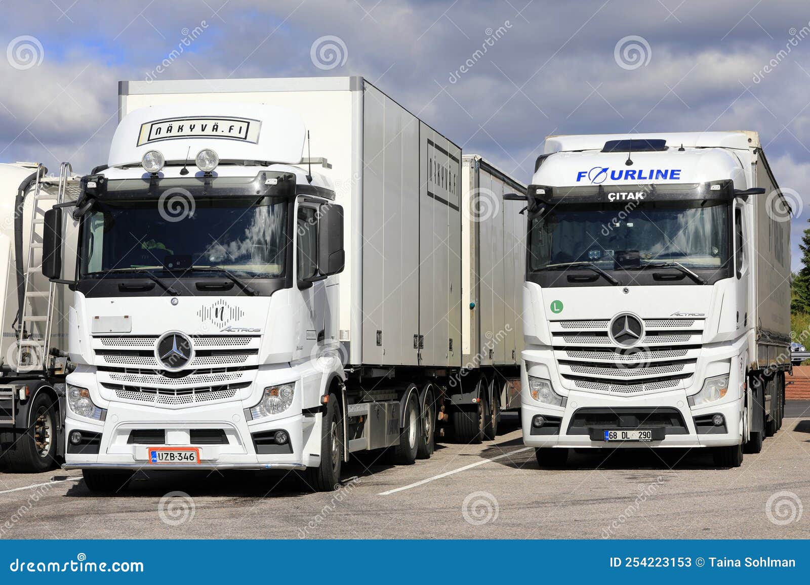 Two White Mercedes-Benz Actros Heavy Trucks Parked Editorial Stock