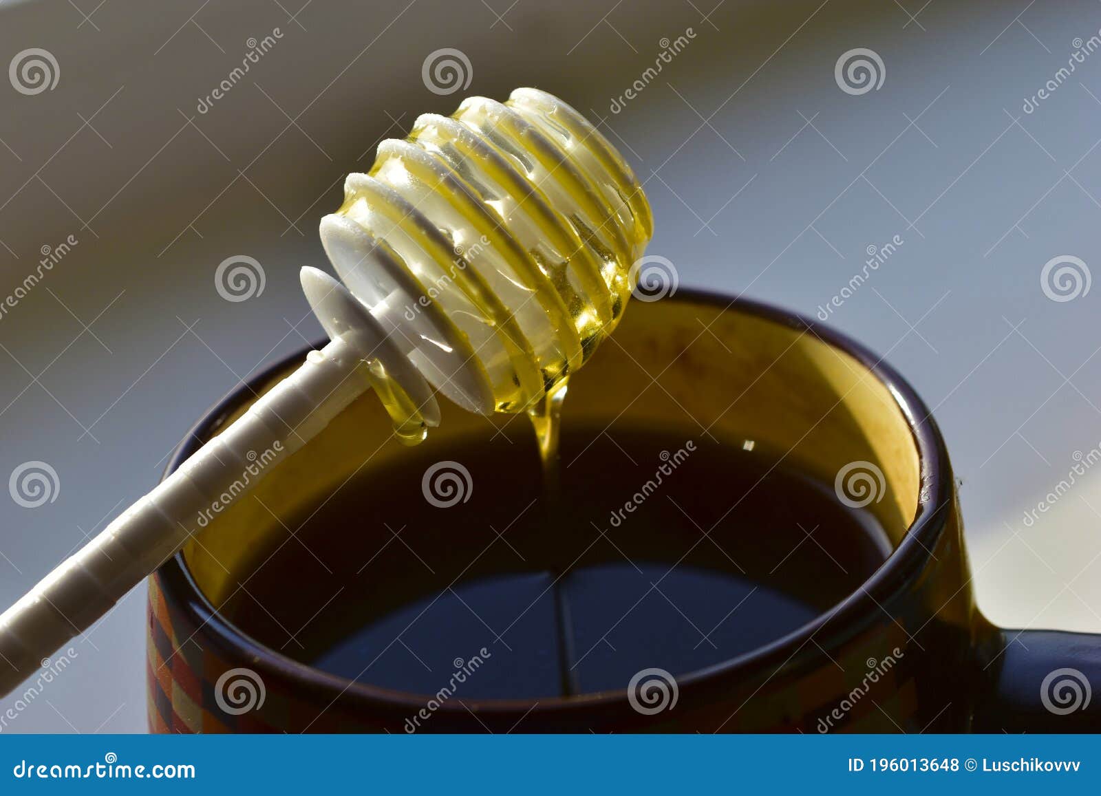 Two White Plastic Honey Spoons Dipped in Nectar Stock Photo Image of