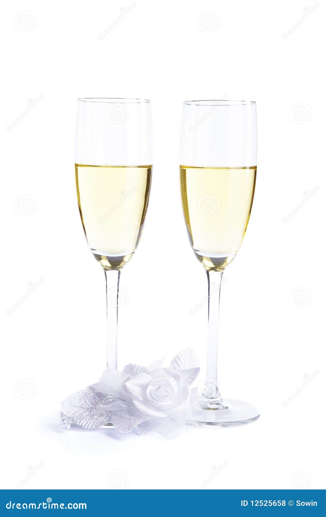 Two Wine Glasses with Champagne and Wedding Flower Stock Photo Image