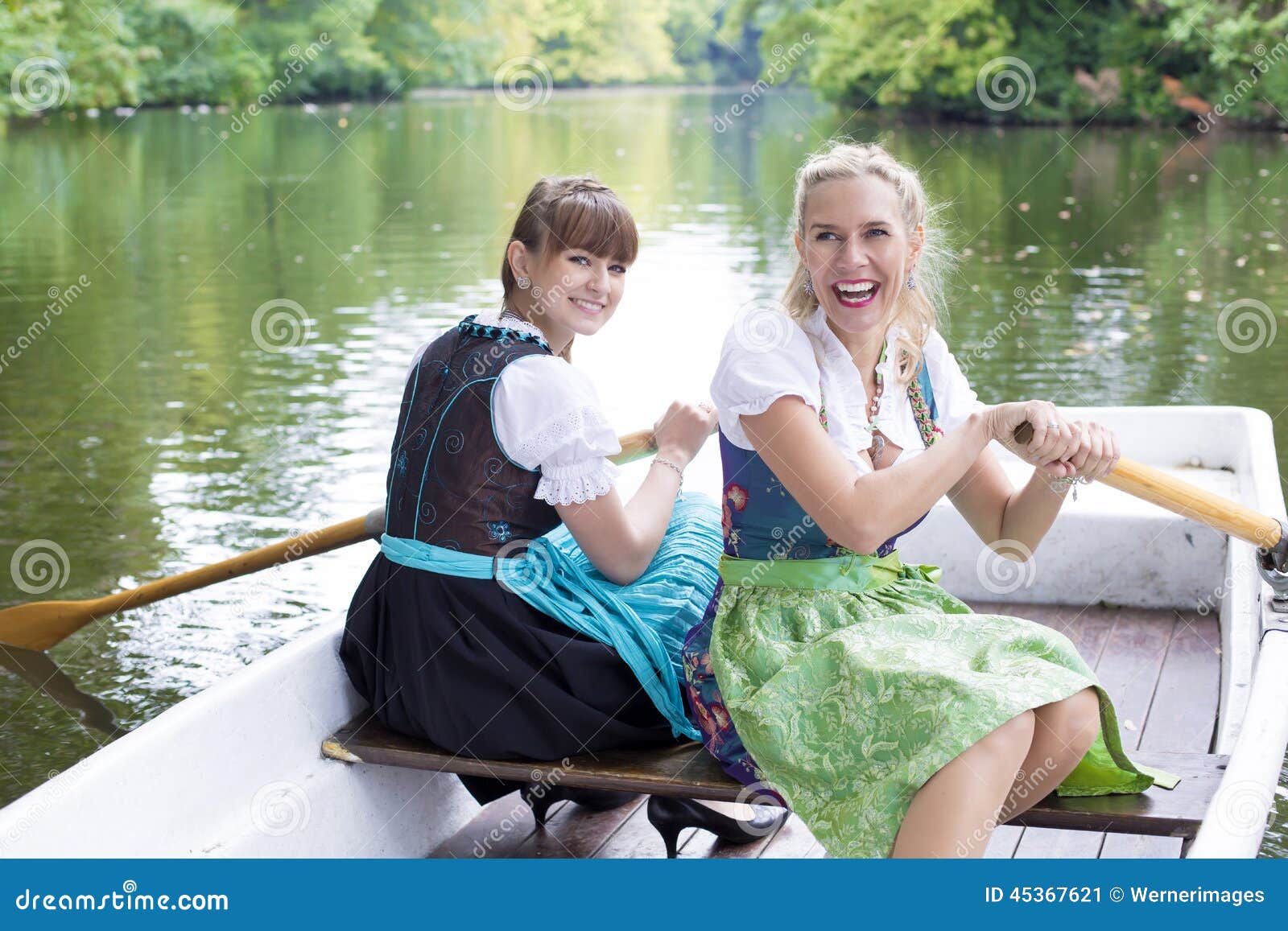 Two woman in a rowing boat stock image. Image of bavarian - 45367621