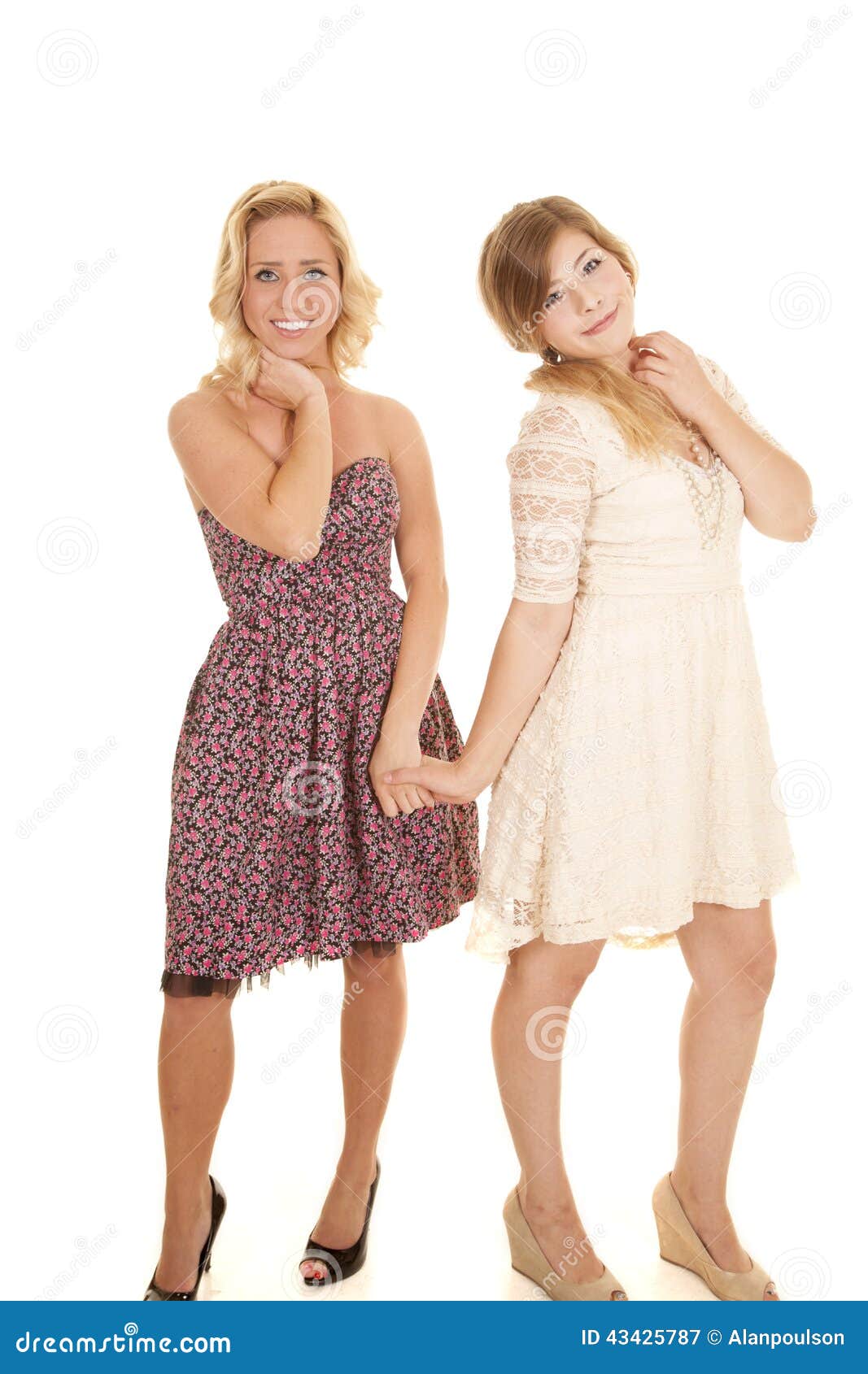 Two Women in Dresses Smile Hold Hand Stock Image - Image of dress ...