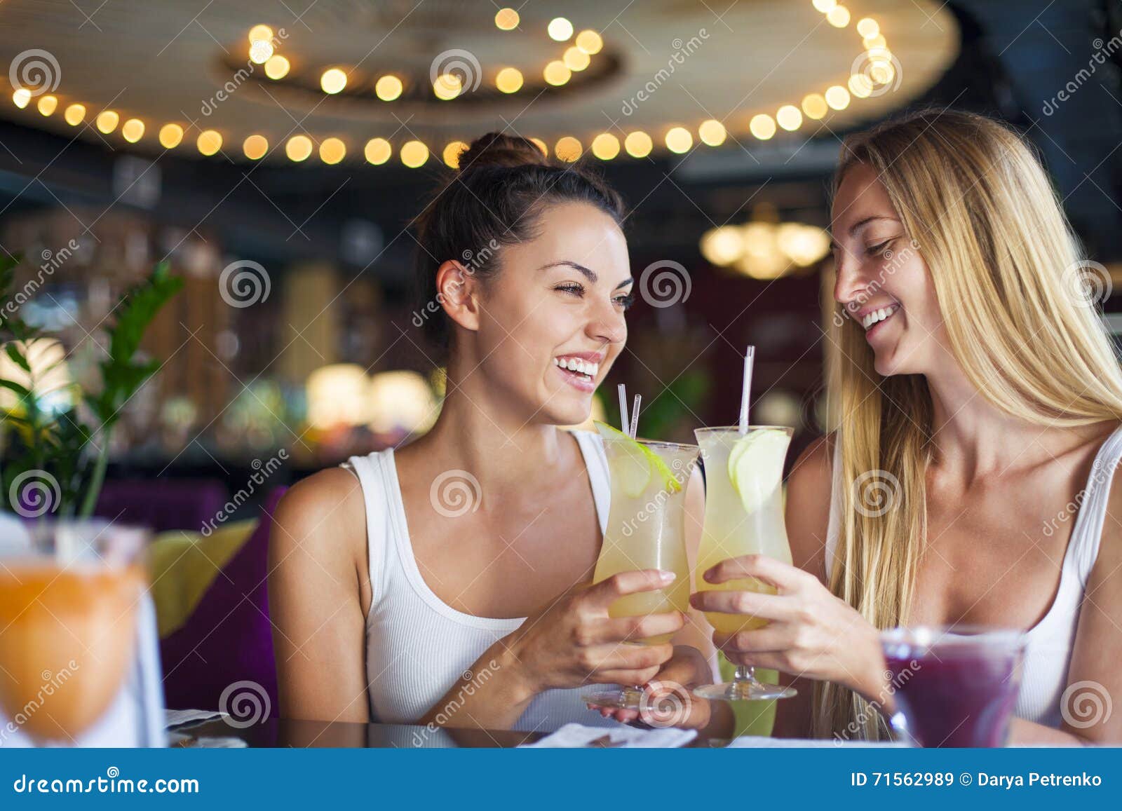 Two Women Having Fun In A Bar Drinking Cocktails Stock Image Image Of Restaurant Outgoing