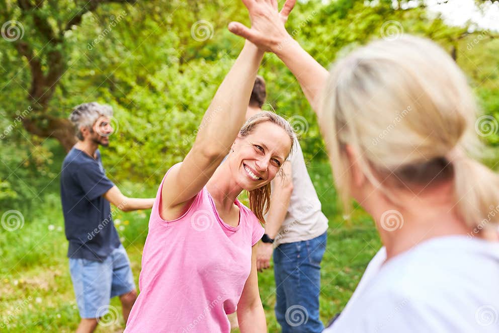 Two Women High Five after a Competition Stock Photo Image of