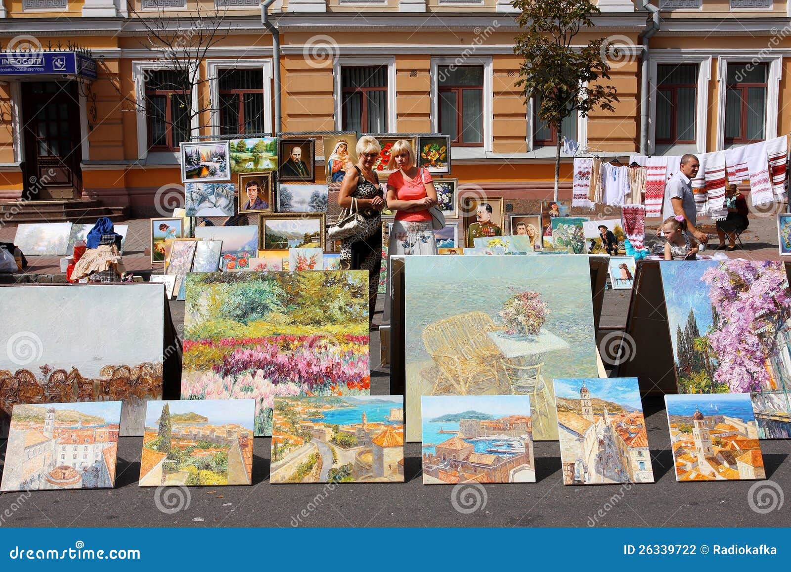 Two Women Looking Paintings Sale Photos - Free & Royalty-Free Stock
