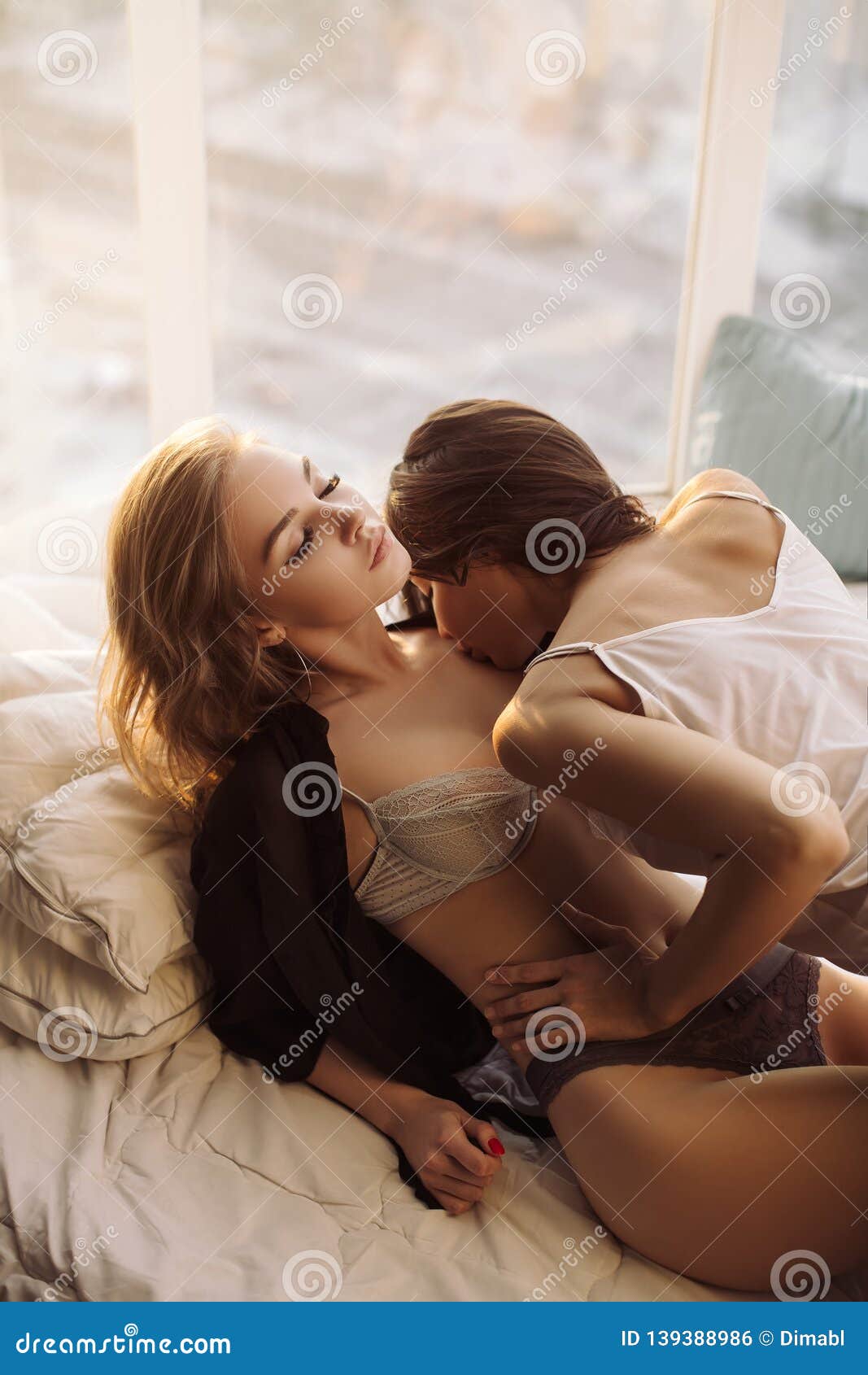 Lesbian kissing in lingerie