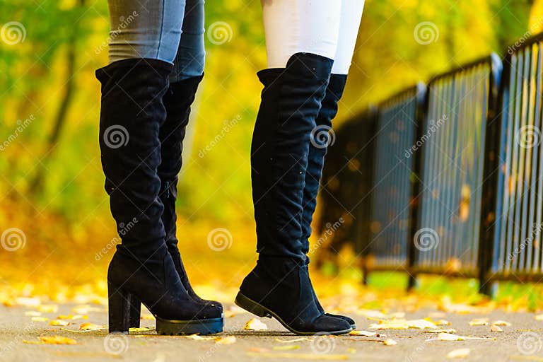 Two Women Wearing Black Knee High Boots Stock Image - Image of boot ...