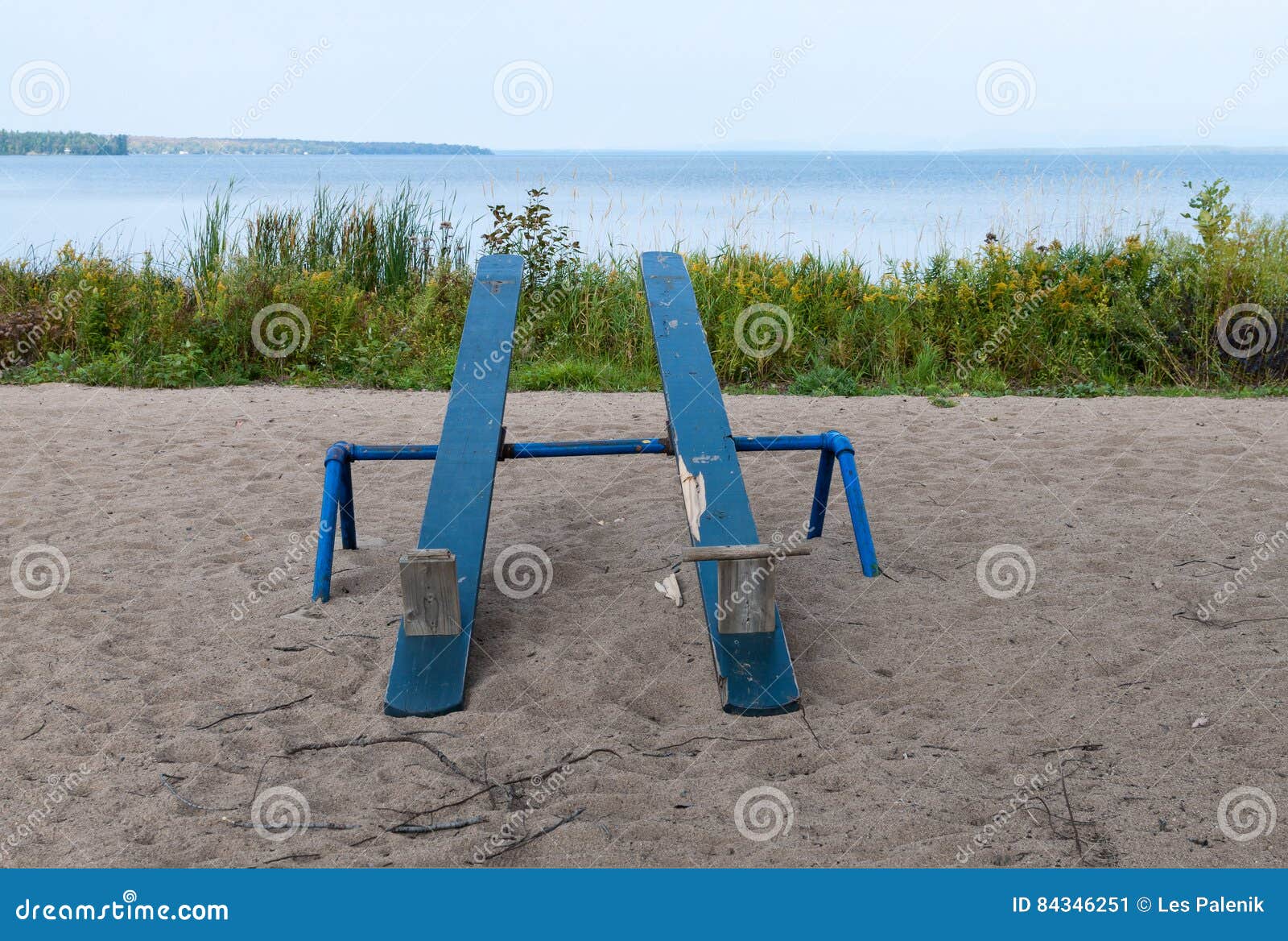 Two wooden seesaws stock image. Image of blue, autumn - 84346251