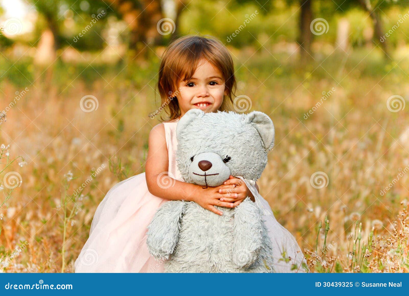 Two-year-old Girl in Field Carrying Stuffed Animal Stock Image - Image of bear, multiracial: 30439325 Two-year-old Girl in Field Carrying Stuffed Animal Stock Image - Image of bear, multiracial: 30439325