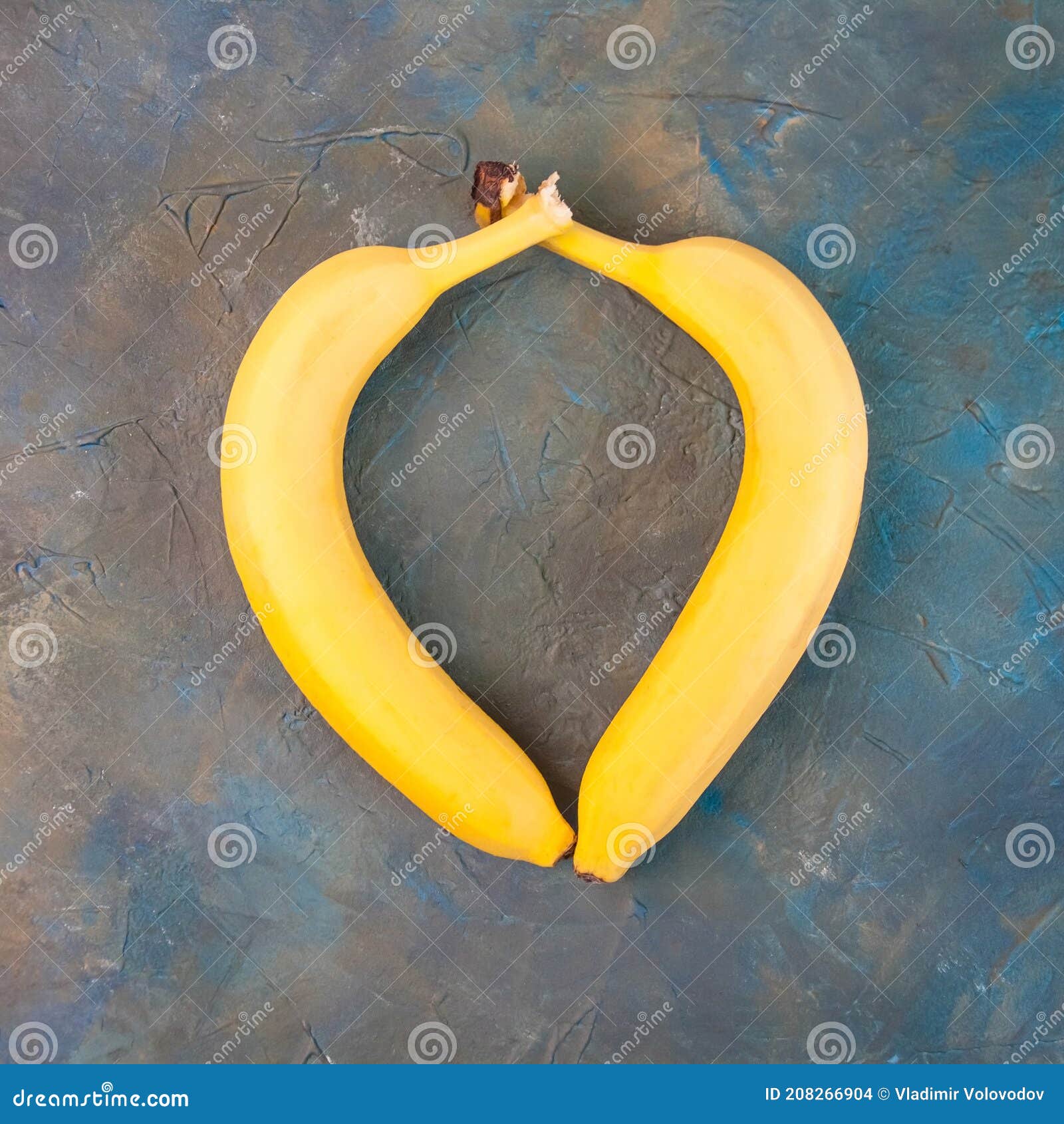 Two Yellow Bananas Are Laid Out In The Shape Of A Heart The Concept Of Valentine S Day Stock
