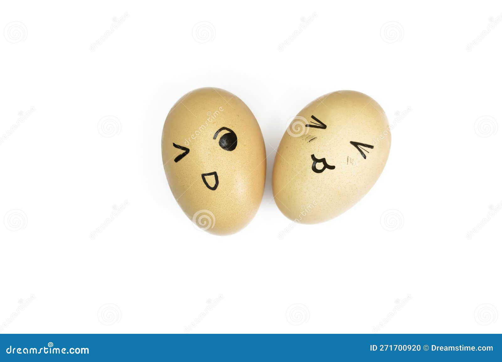 Two Yellow Eggs with Painted Emoticons on a White Background. Eggs with