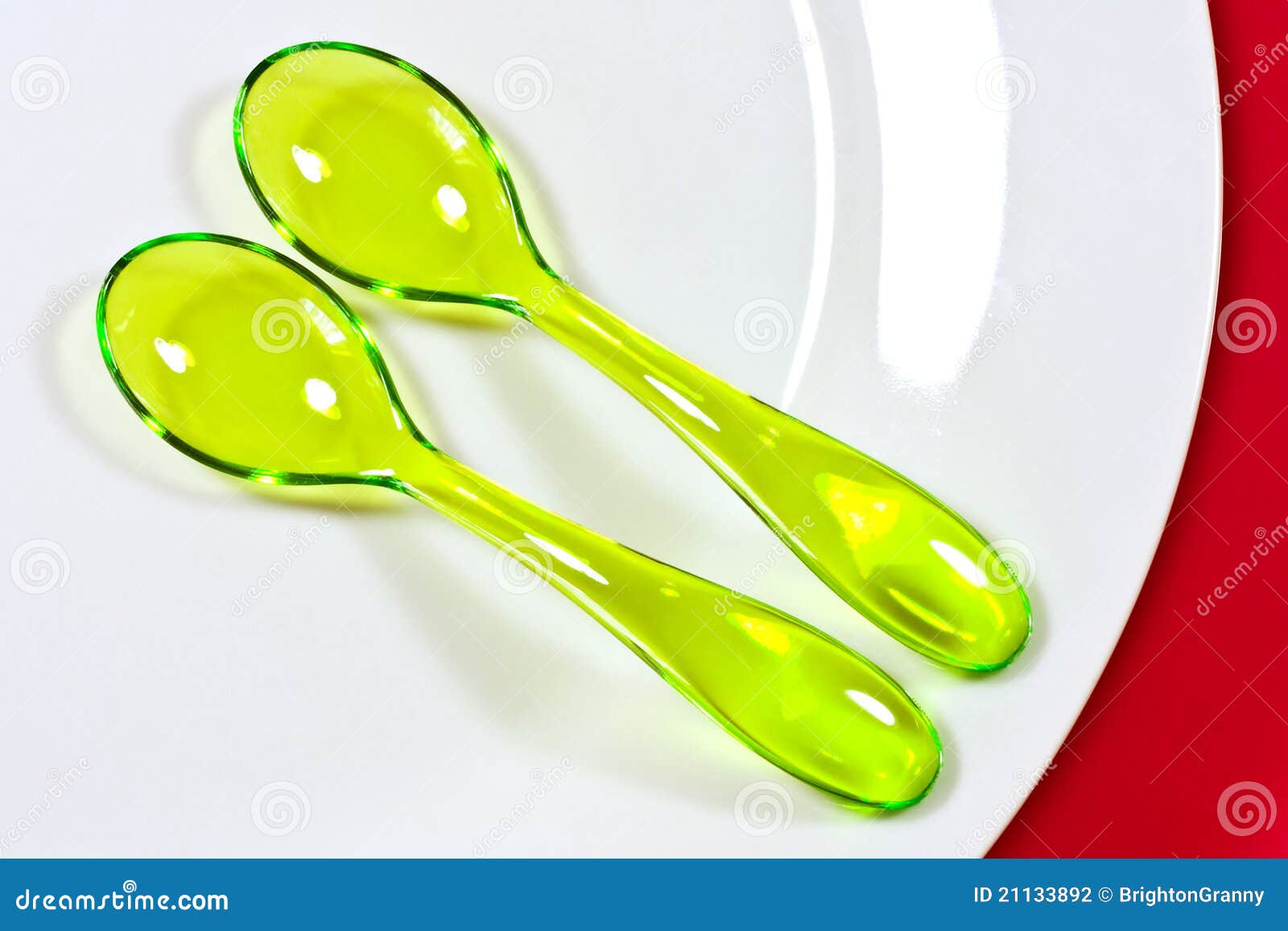 Two Yellow Plastic Spoons stock photo. Image of spoons 21133892