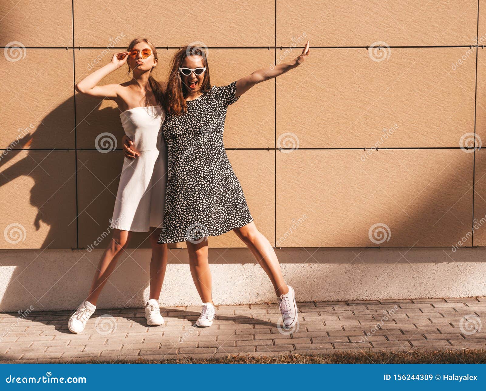 Two Young Beautiful Smiling Hipster Girls in Trendy Summer Clothes ...