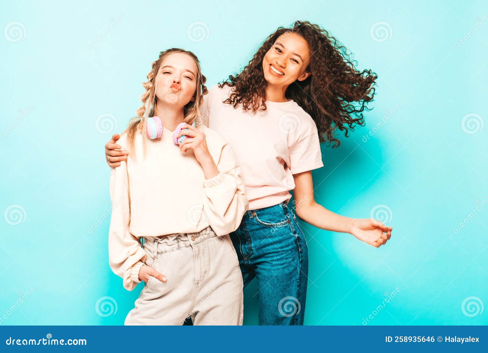 Two Young Beautiful Women Posing in Studio Stock Photo - Image of ...