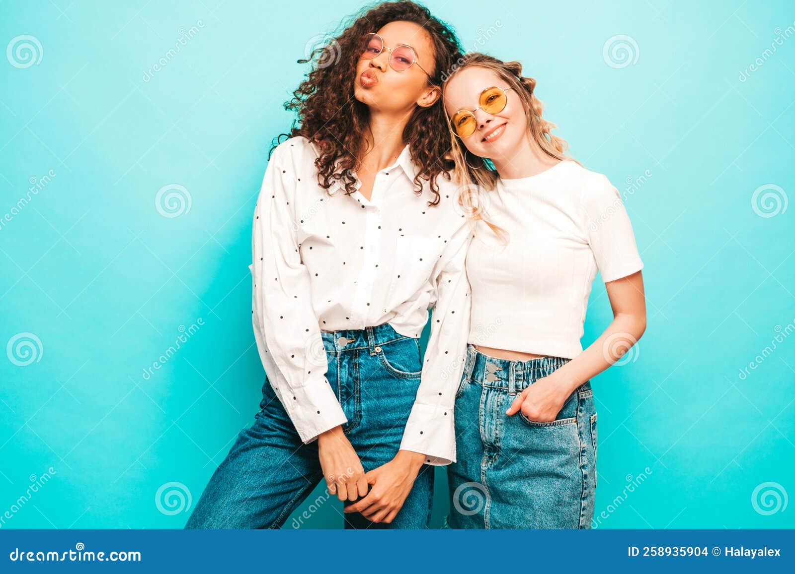 Two Young Beautiful Women Posing in Studio Stock Photo - Image of ...