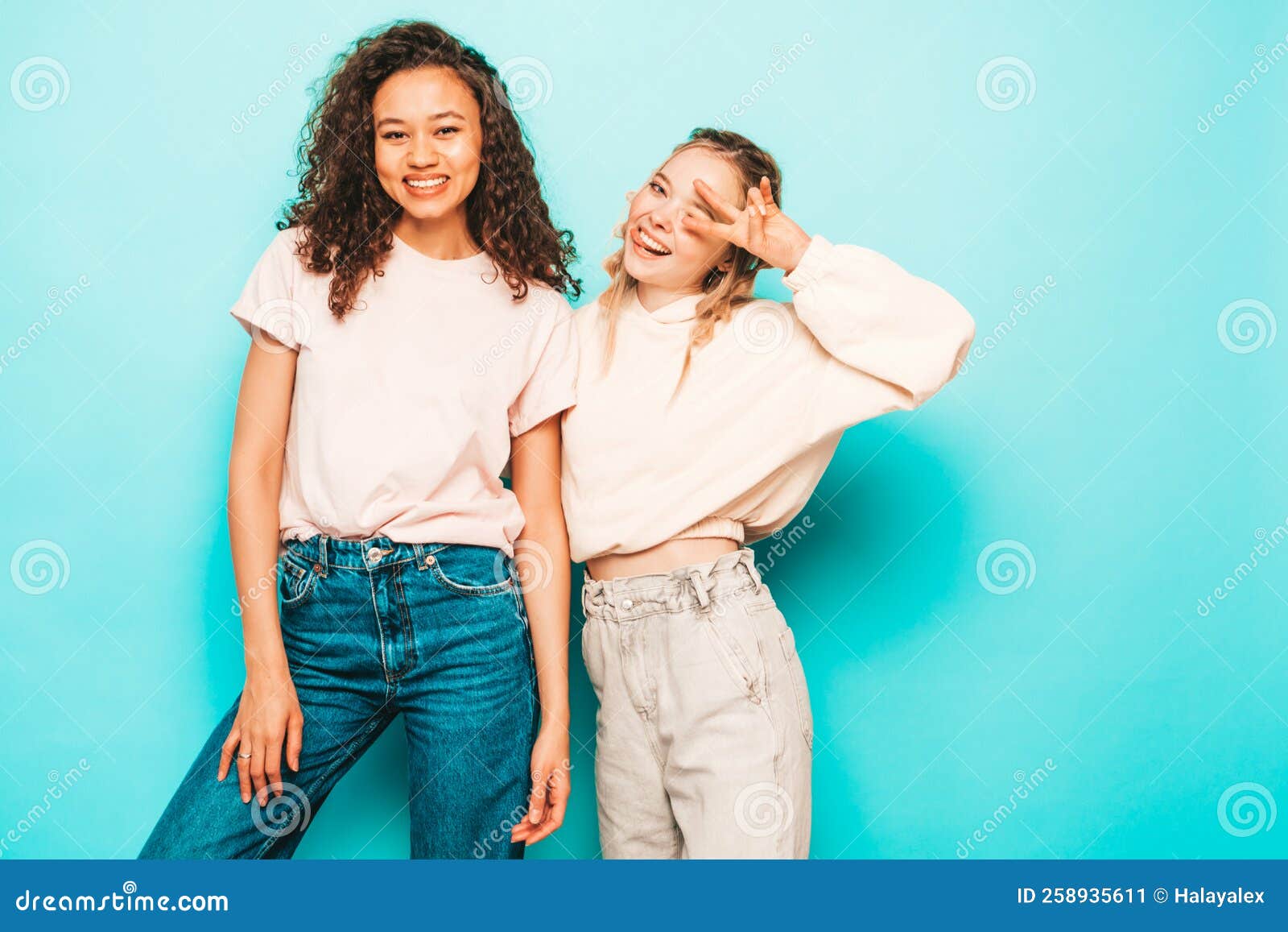 Two Young Beautiful Women Posing in Studio Stock Image - Image of ...